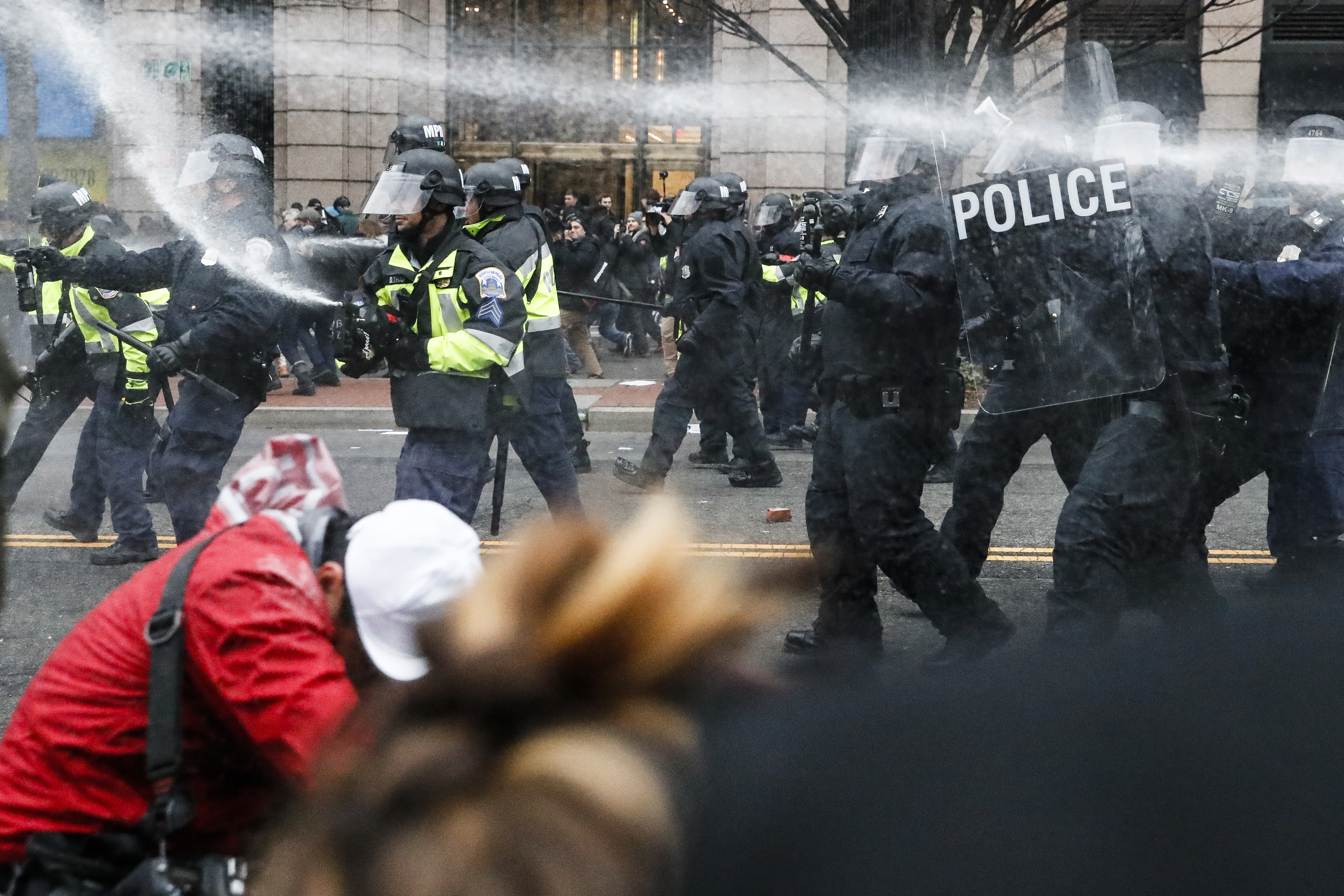 Police fire pepper spray at protesters in Washington, DC