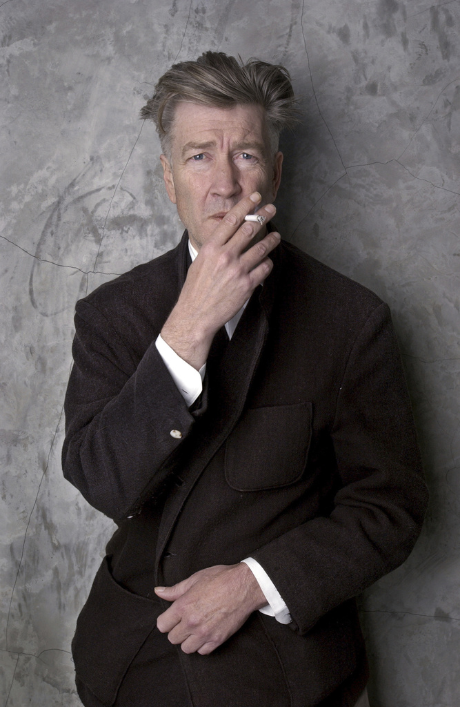 David Lynch smokes a cigarette