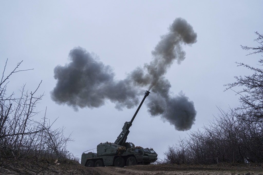 A Ukrainian self-propelled howitzer Dita of Azov brigade fires towards Russian positions at frontline in Donetsk region, Ukraine, Thursday Jan. 23, 2025. (AP Photo/Evgeniy Maloletka)
