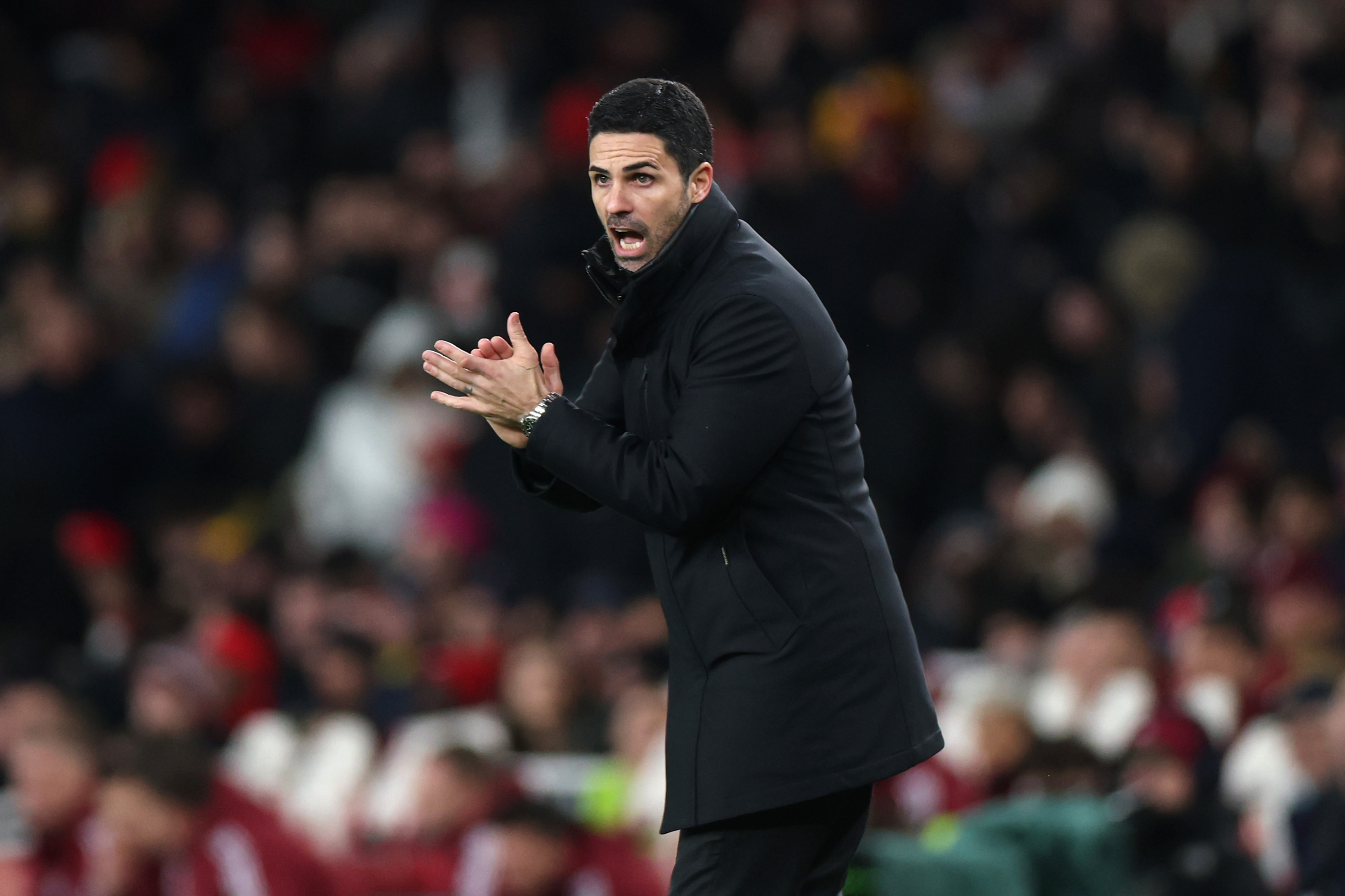 LONDON, ENGLAND - JANUARY 07: Mikel Arteta, Manager of Arsenal, reacts during the Carabao Cup Semi Final First Leg match between Arsenal and Newcastle United at Emirates Stadium on January 07, 2025 in London, England. (Photo by Alex Pantling/Getty Images)