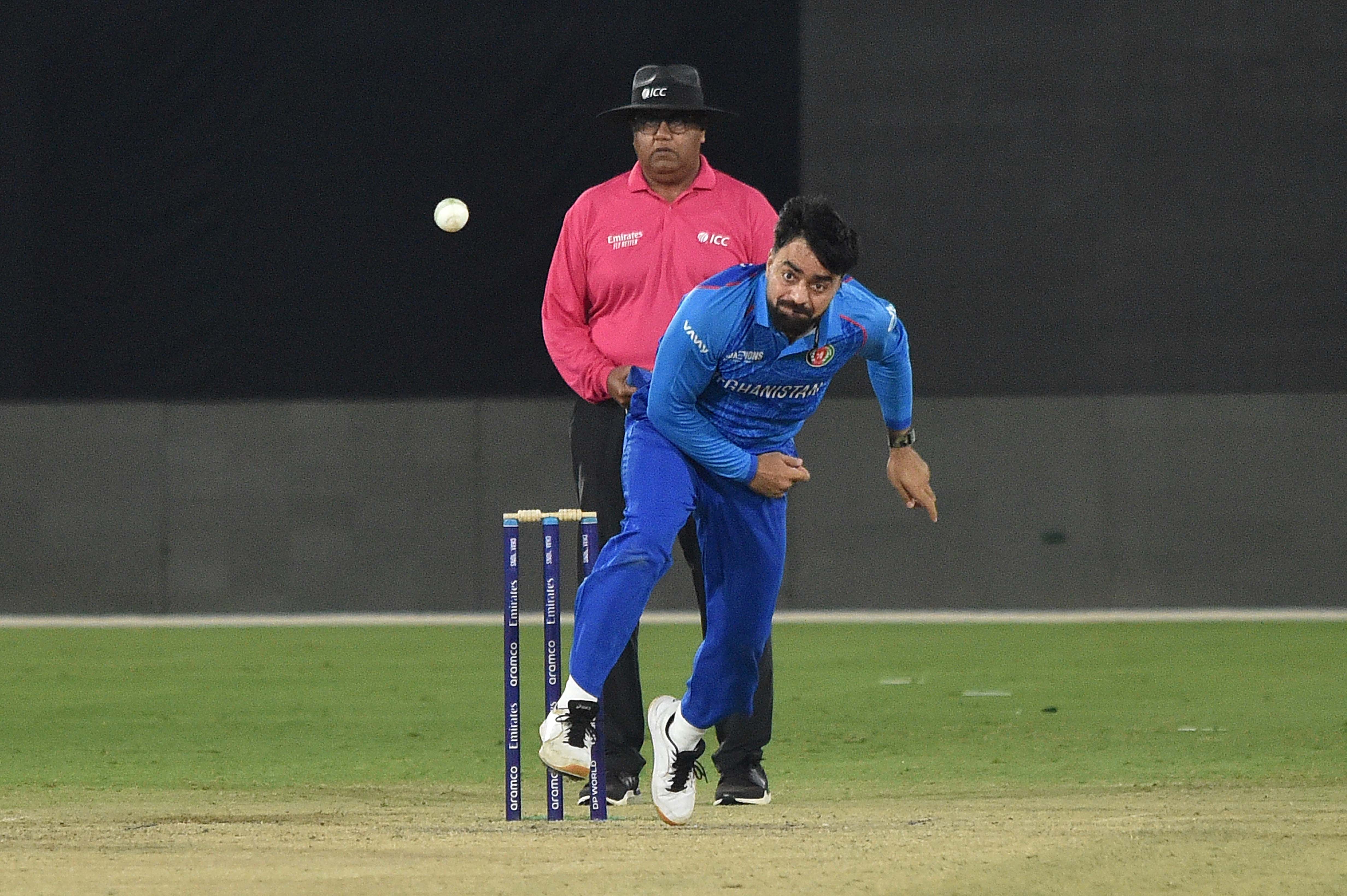 epa11901967 Afghanistan's Rashid Khan bowls during a warm up match ahead of the ICC men's champions trophy in Karachi, Pakistan, 16 February 2025. EPA-EFE/SHAHZAIB AKBER