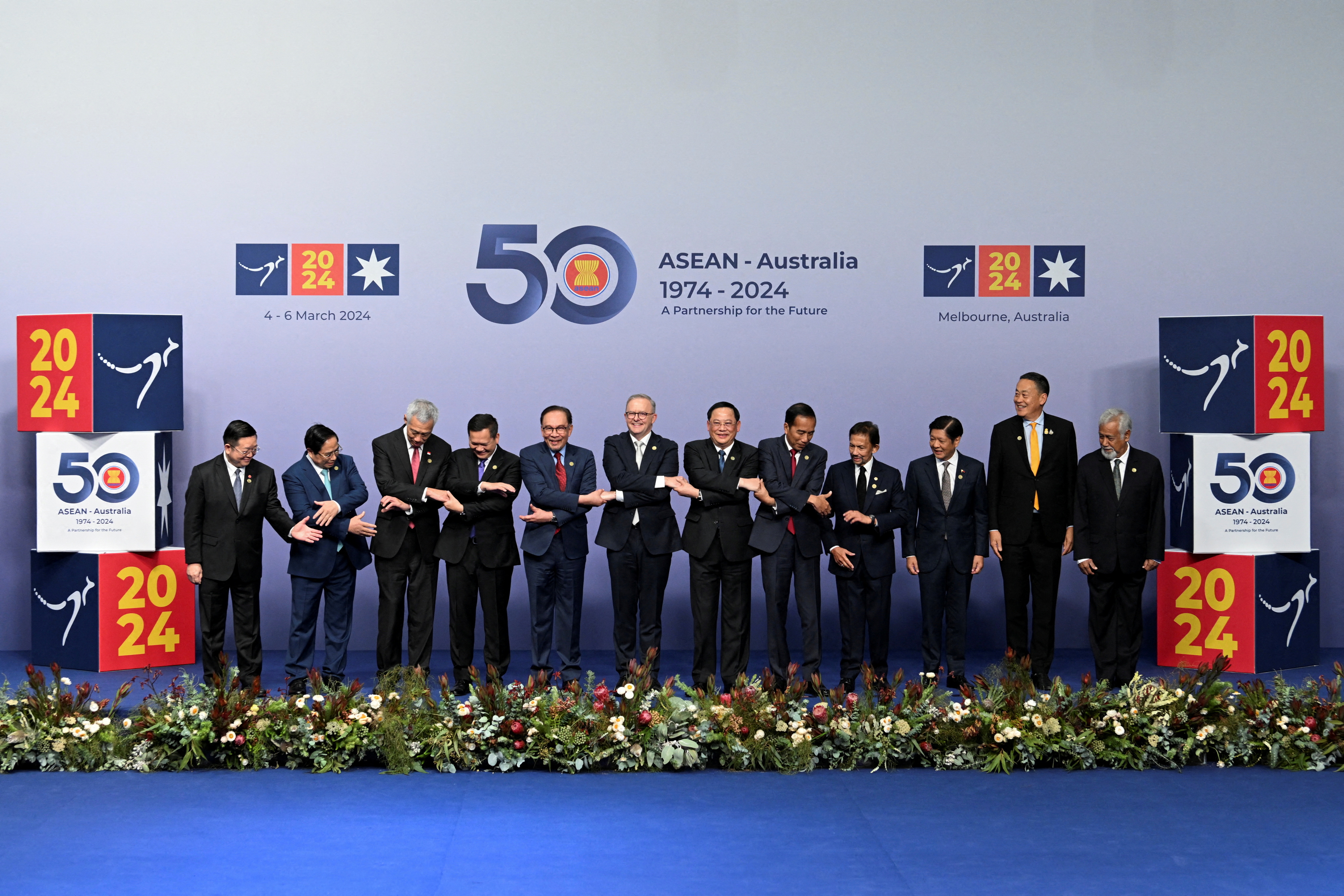 Australia's Prime Minister Anthony Albanese, Laos' Prime Minister Sonexay Siphandone, Brunei's Sultan Hassanal Bolkiah, Cambodia's Prime Minister Hun Manet, Indonesia's President Joko Widodo, Malaysia's Prime Minister Anwar Ibrahim, Philippines President Ferdinand Marcos Jr, Singapore's Prime Minister Lee Hsien Loong, Thailand's Prime Minister Srettha Thavisin, Vietnam's Prime Minister Pham Minh Chinh, Prime Minister of Timor-Leste Xanana Gusmao and Secretary-General of ASEAN, Dr Kao Kim Hourn pose for a family photo at the ASEAN-Australia Special Summit, in Melbourne, Australia March 5, 2024. REUTERS/Jaimi Joy