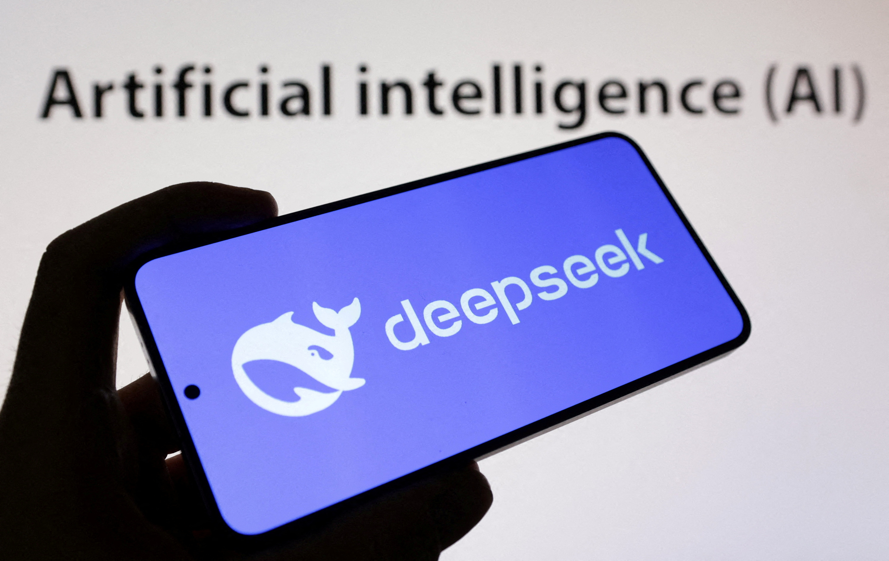 The Deepseek logo and words reading "Artificial Intelligence AI" are seen in this illustration taken on January 29, 2025.