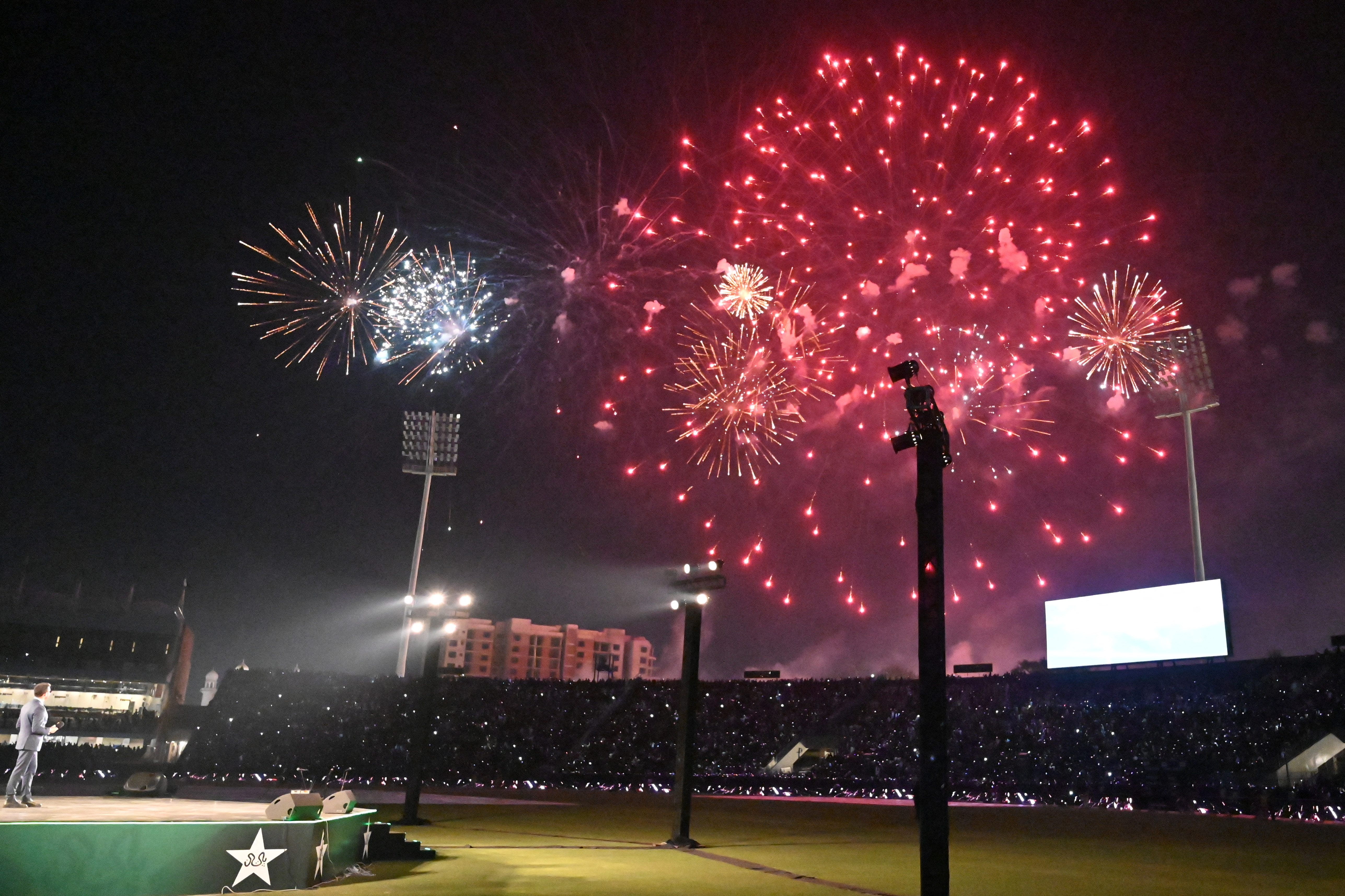 Fireworks explode above cricket stadium