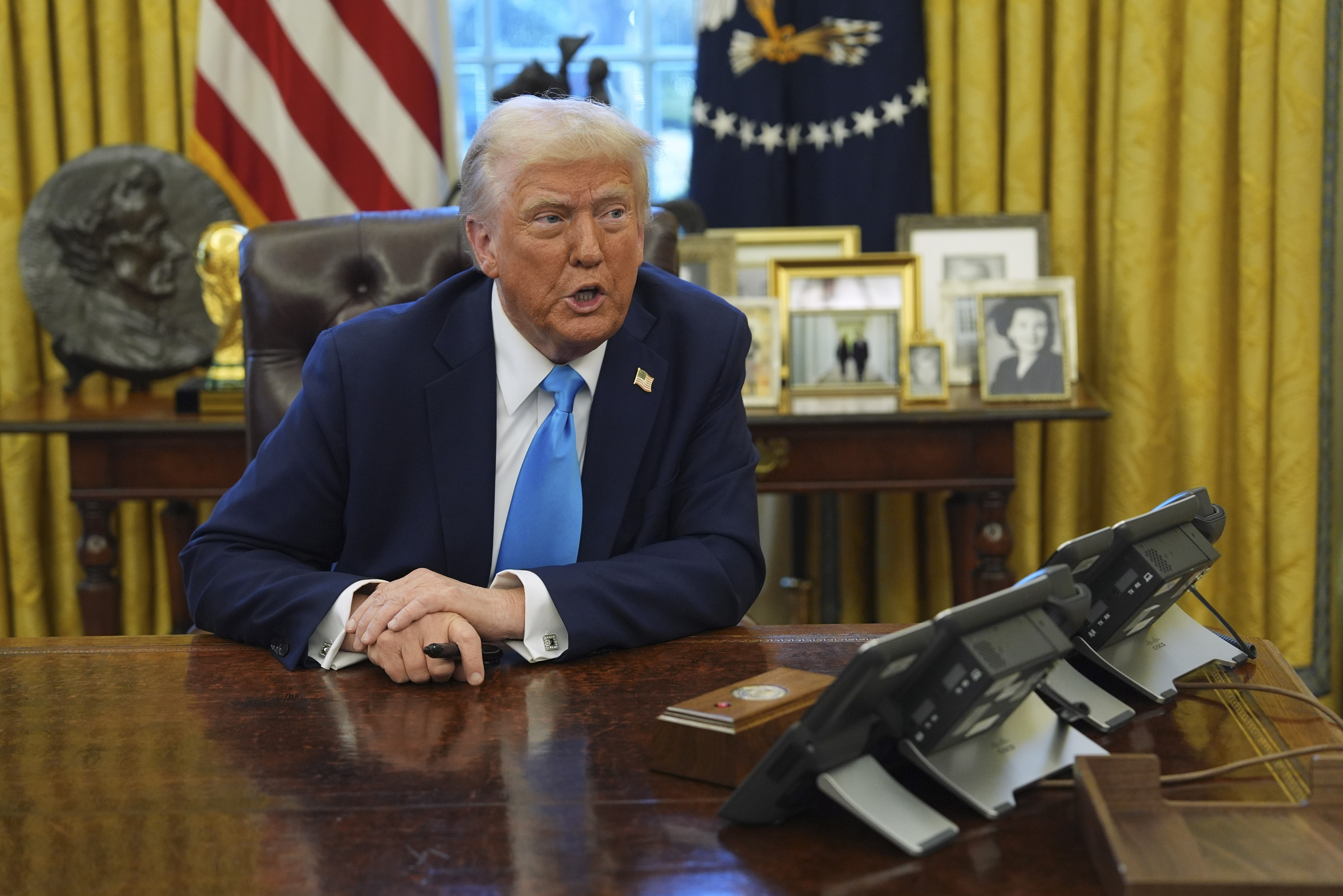 Donald Trump at the Resolute Desk in Oval Office