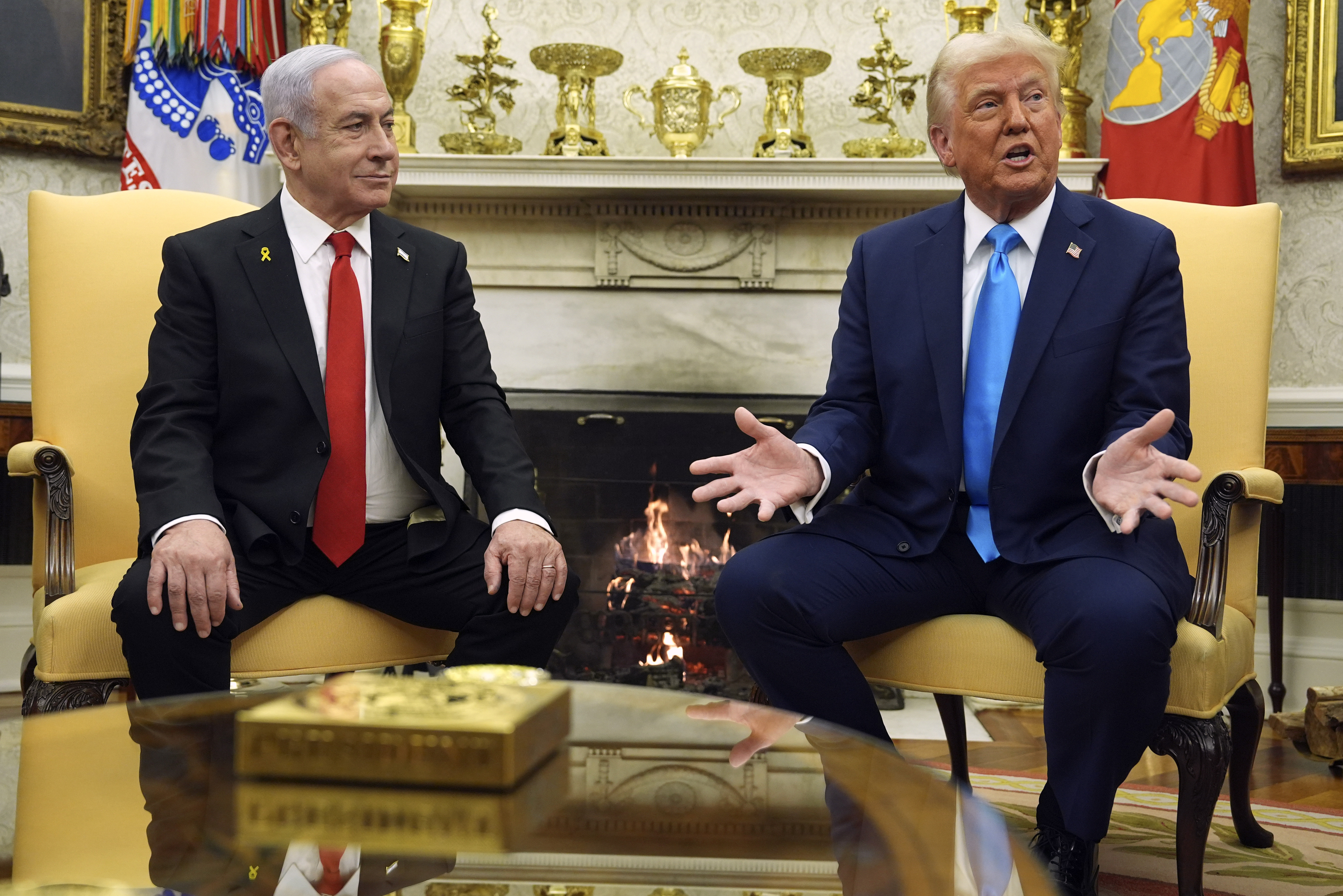 Donald Trump and Benjamin Netanyahu sit in the White House