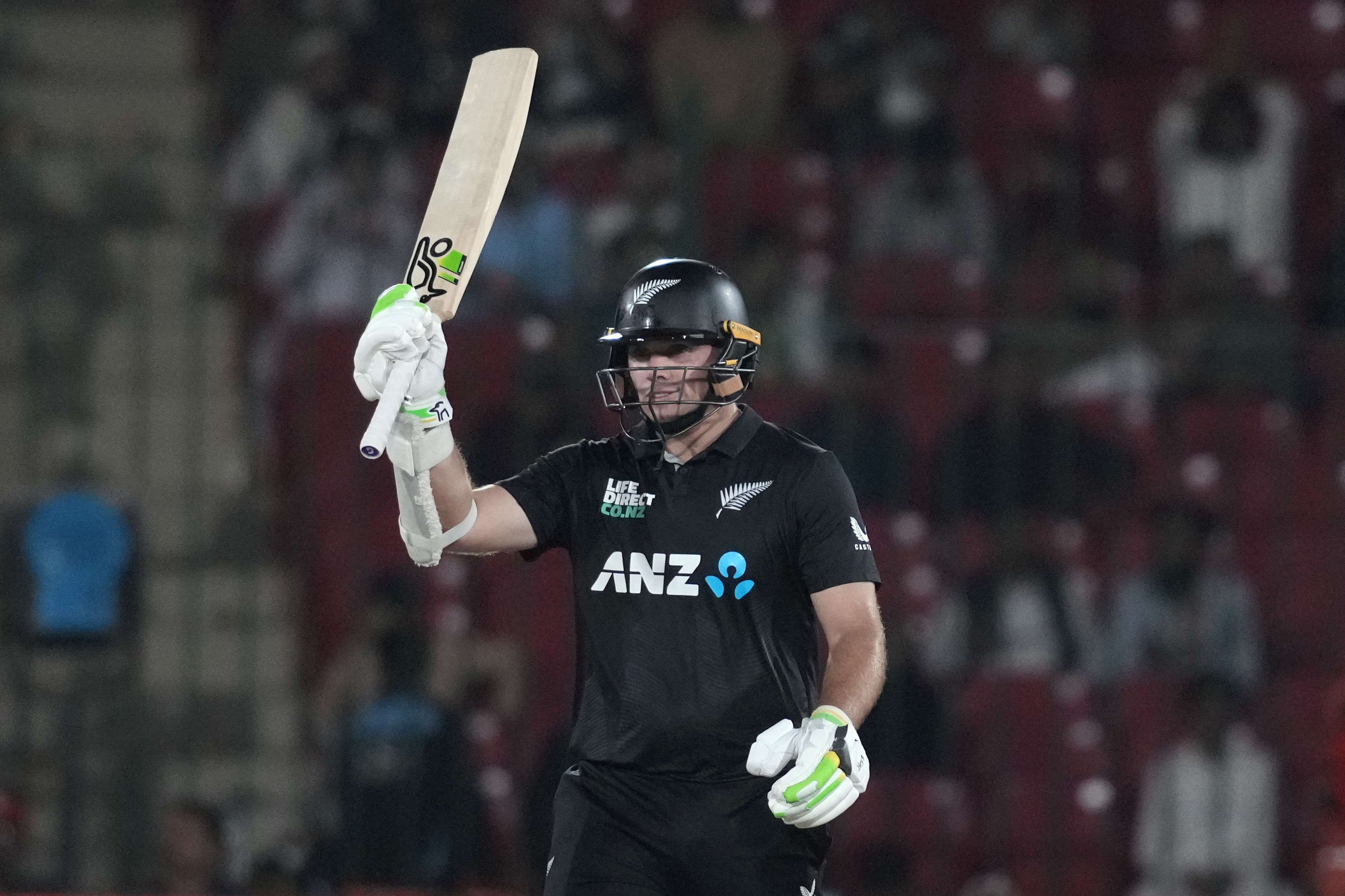 New Zealand's Tom Latham celebrate after scoring fifty during the tri-series ODI cricket final match between Pakistan and New Zealand, in Karachi, Pakistan, Friday, Feb. 14, 2025. (AP Photo/Fareed Khan)