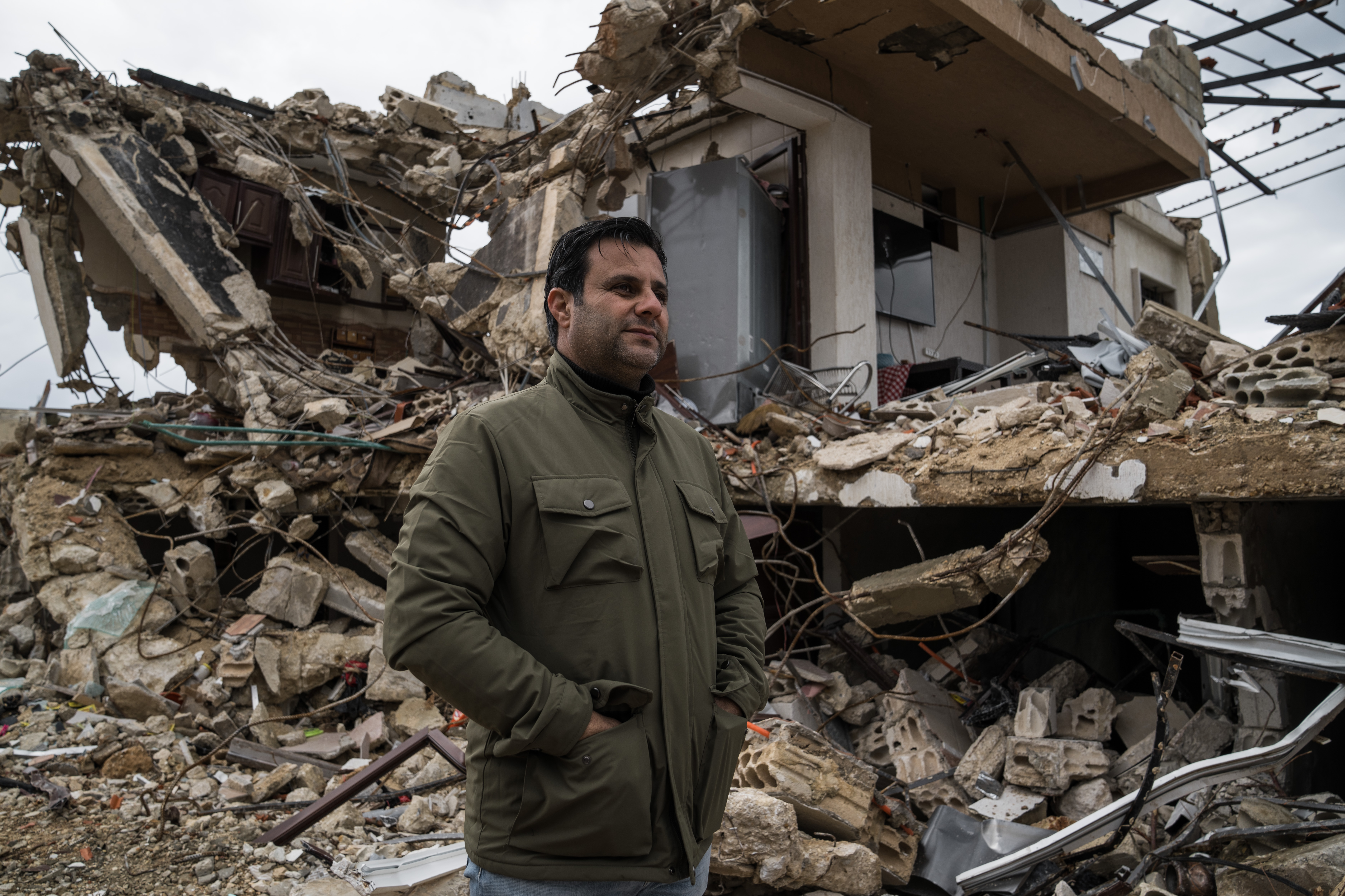 Abbas Awada still hasn't taken his children to see his demolished home (Raghed Waked/Al Jazeera)