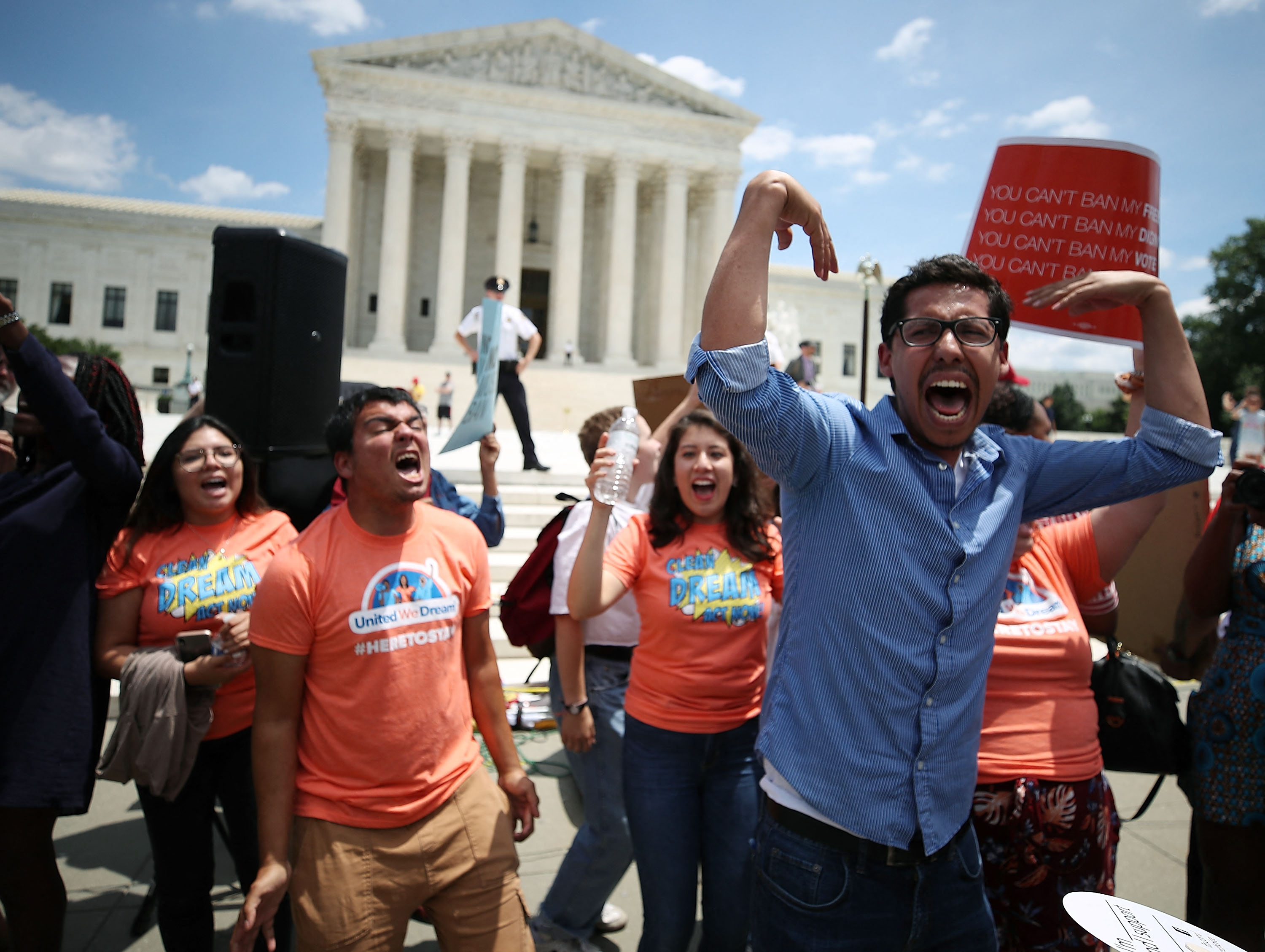 Protesters outside the Supreme Court demonstrate against Trump's travel ban