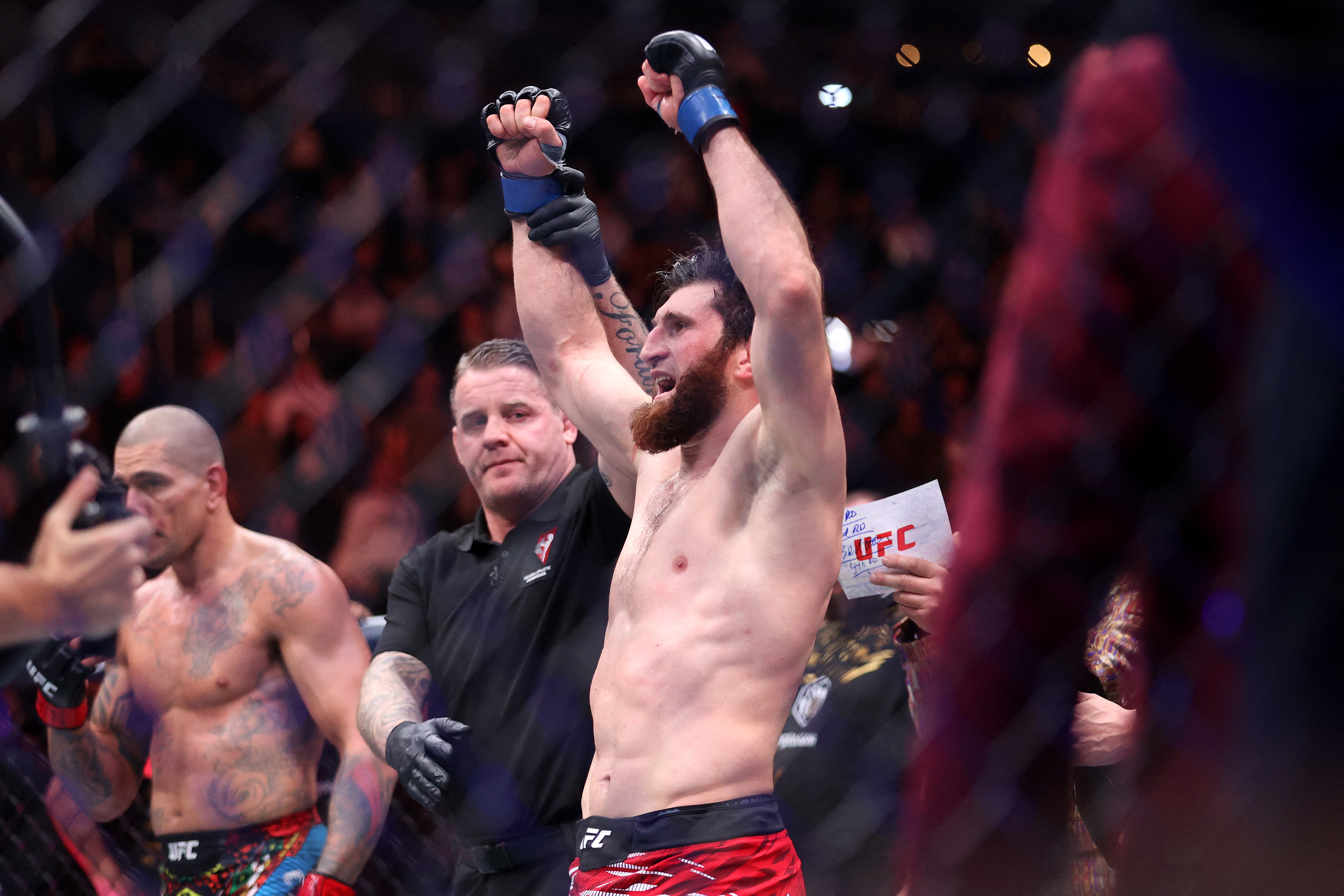 Magomed Ankalaev reacts.