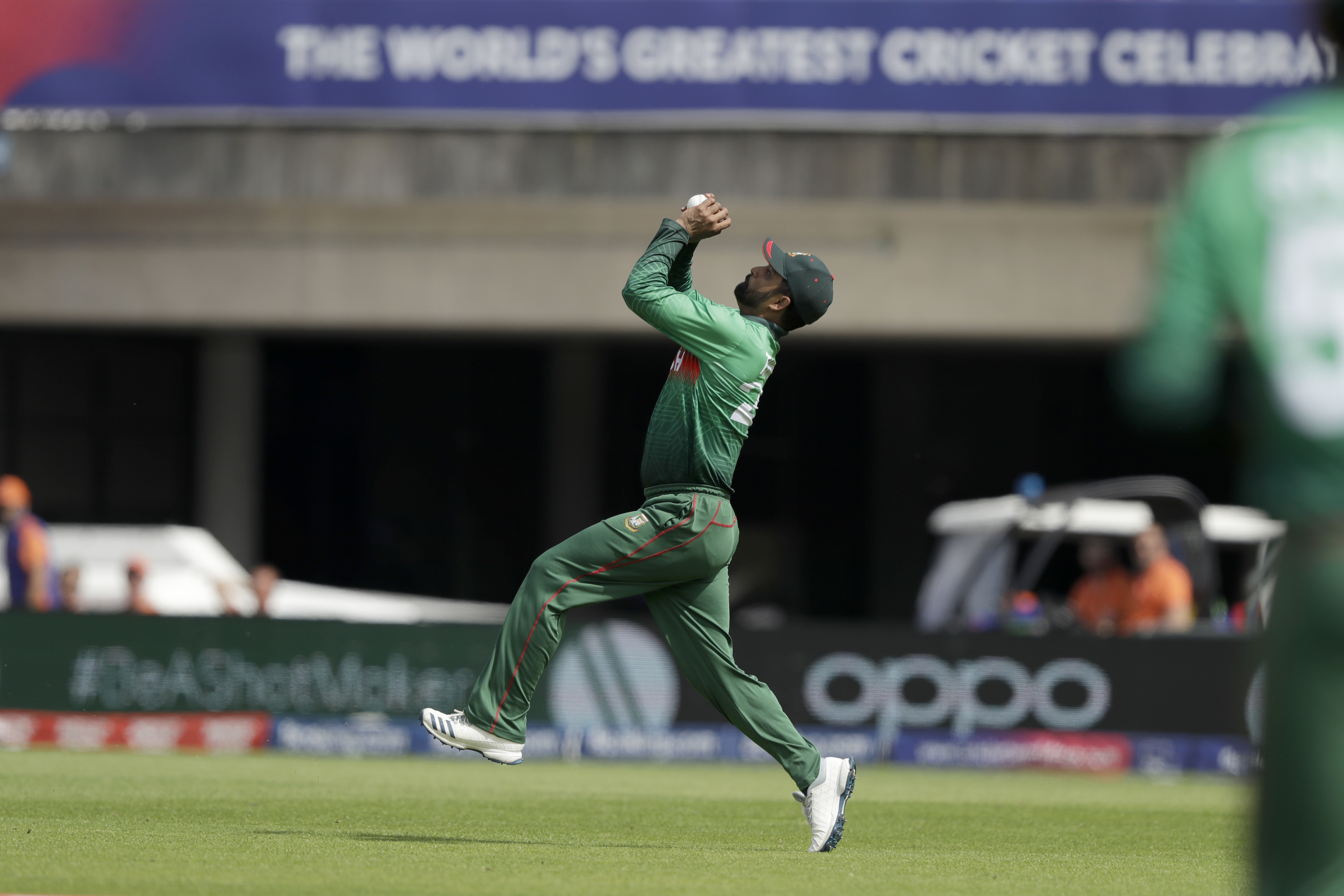Bangladesh's Tamim Iqbal catches out Afghanistan's Rahmat Shah during the Cricket World Cup match between Bangladesh and Afghanistan at the Hampshire Bowl in Southampton, England, Monday, June 24, 2019. (AP Photo/Matt Dunham)