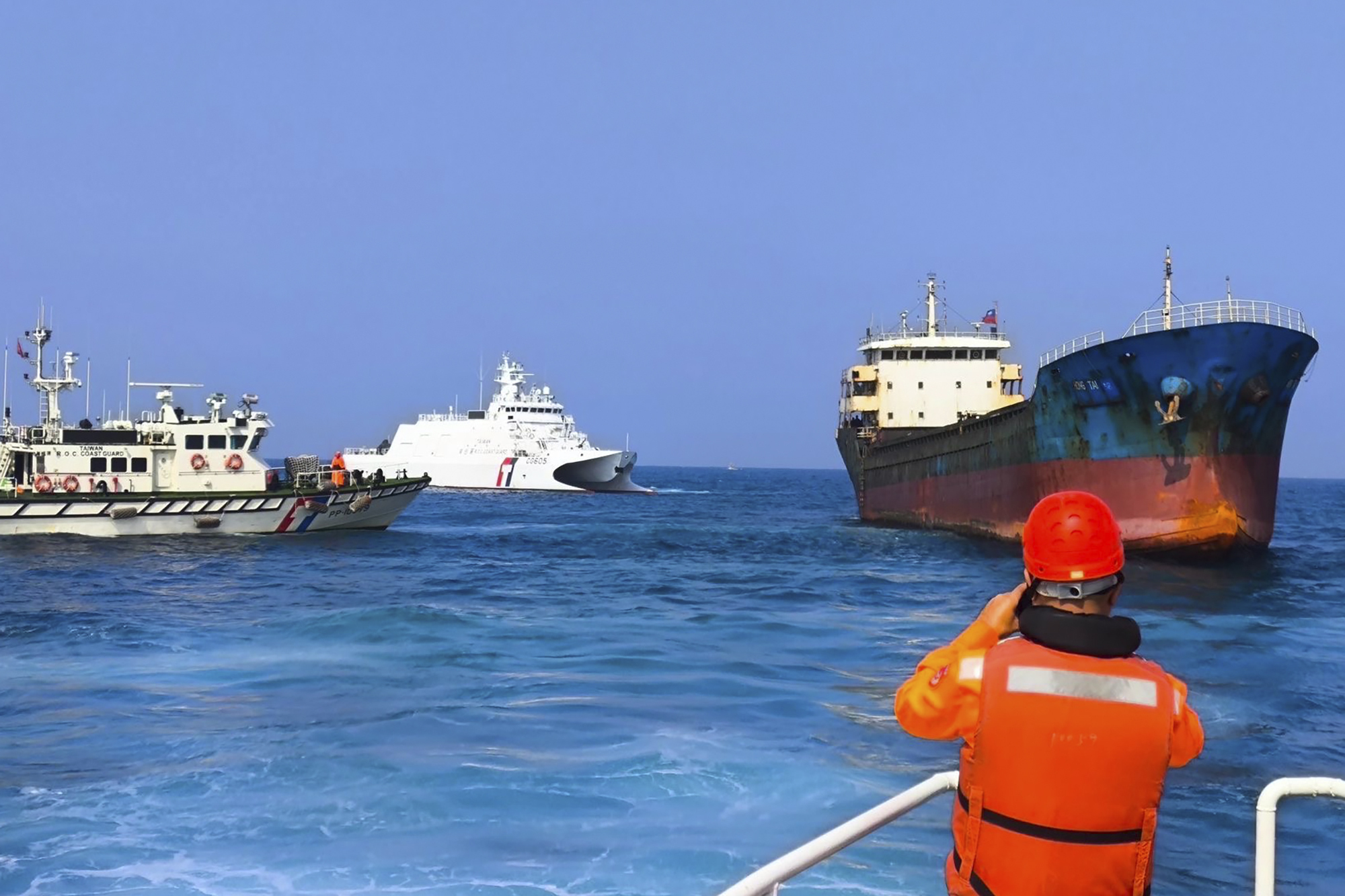 Taiwan's Coast Guard prepares to board the Togo-flagged cargo ship Hong Tai 58.