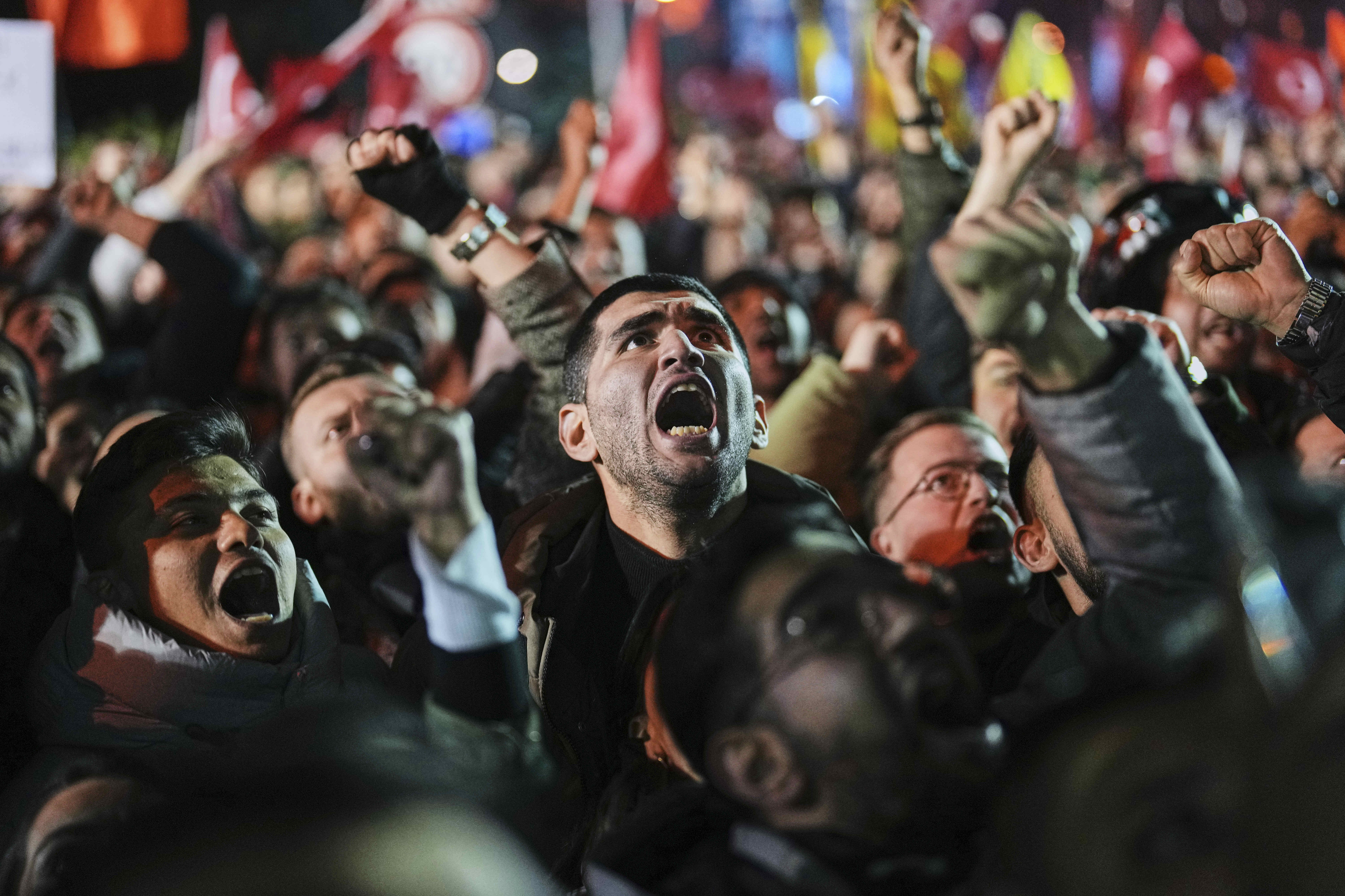 People protest against the arrest of Istanbul Mayor Ekrem Imamoglu outside the City Hall in Istanbul, Turkey, Wednesday, March 19, 2025. (AP Photo/Francisco Seco)