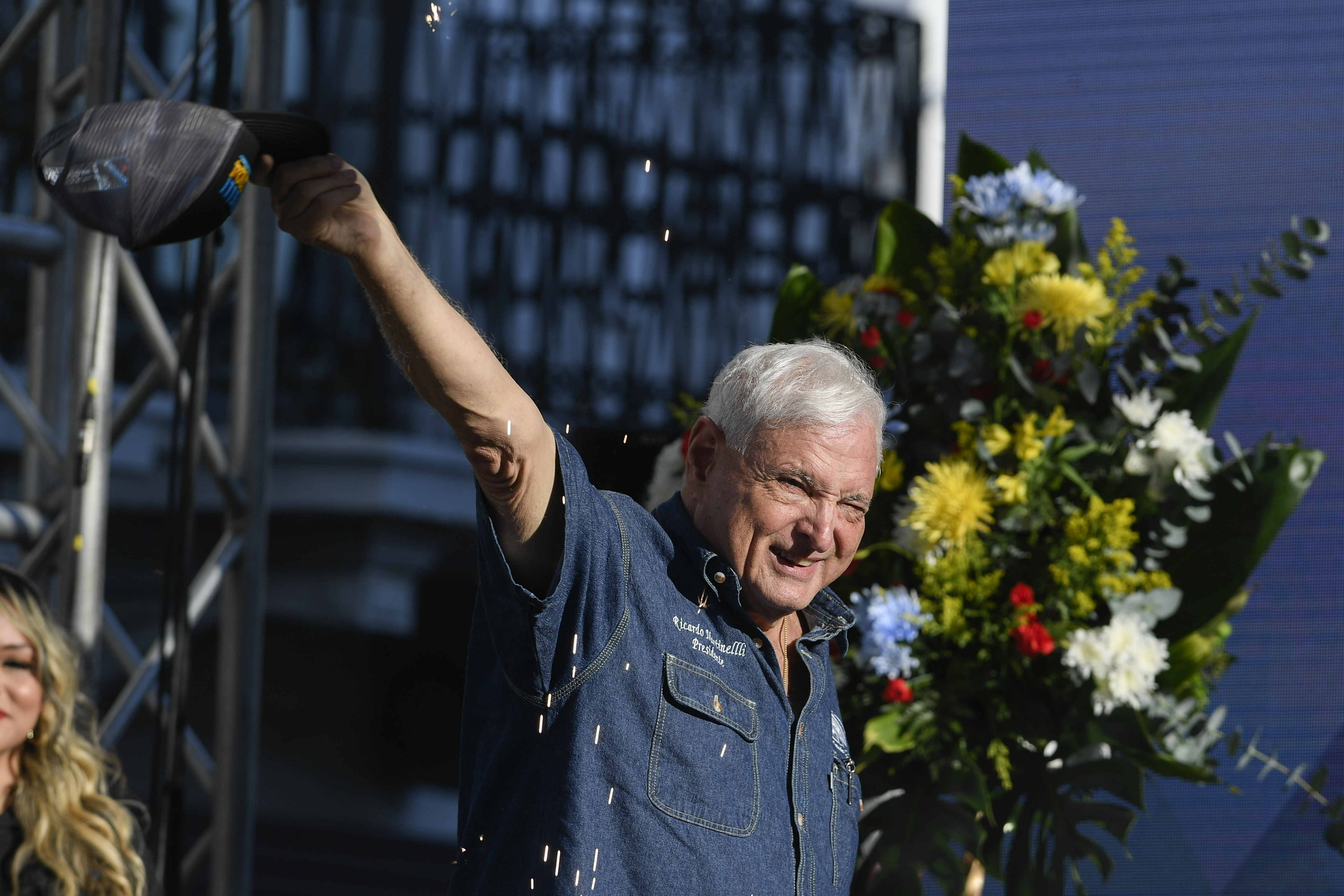 Ricardo Martinelli waves to supporters at a campaign rally in 2024