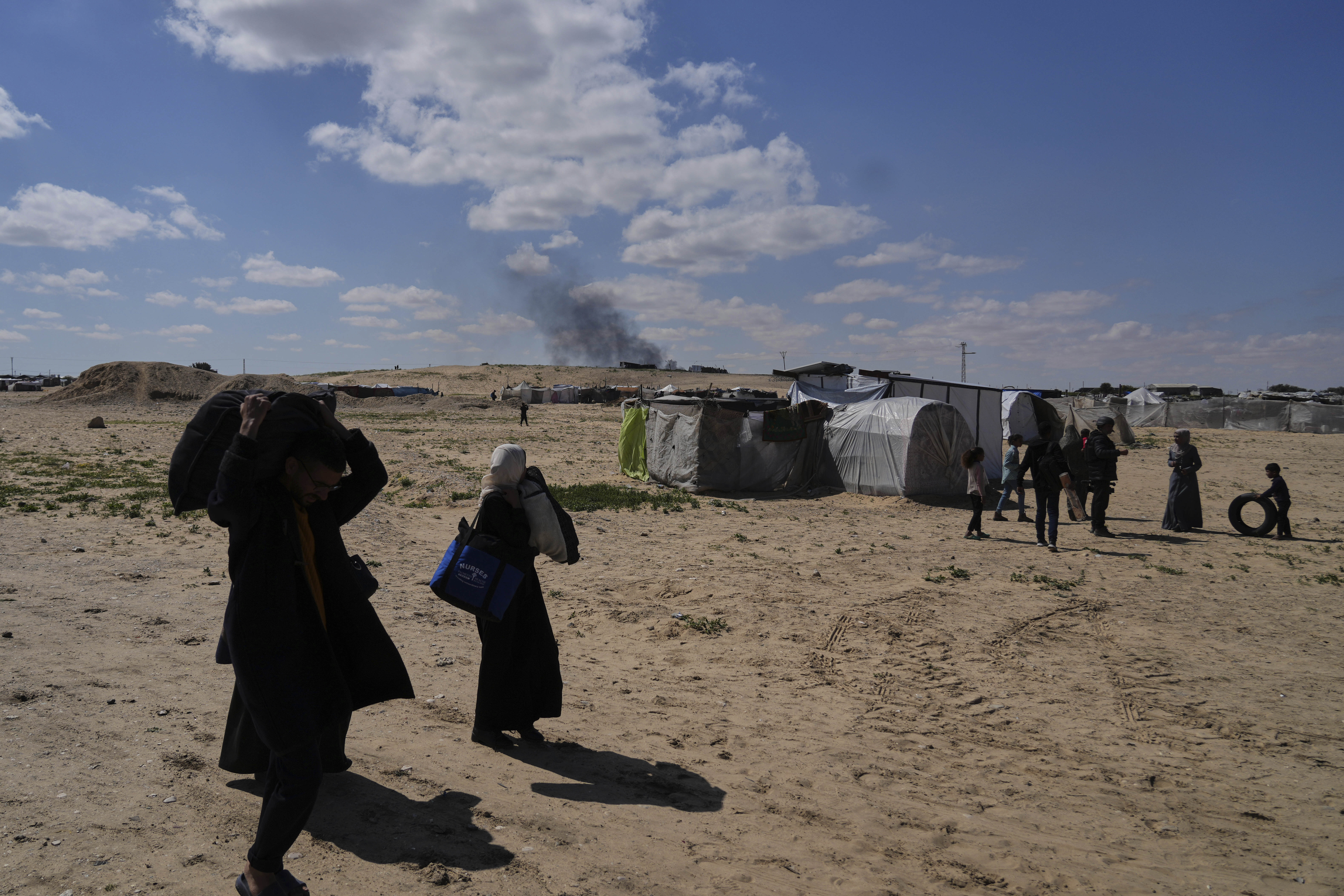 Families flee with few belongings as Gaza's shelters overflow, leaving many without tents or essential supplies.