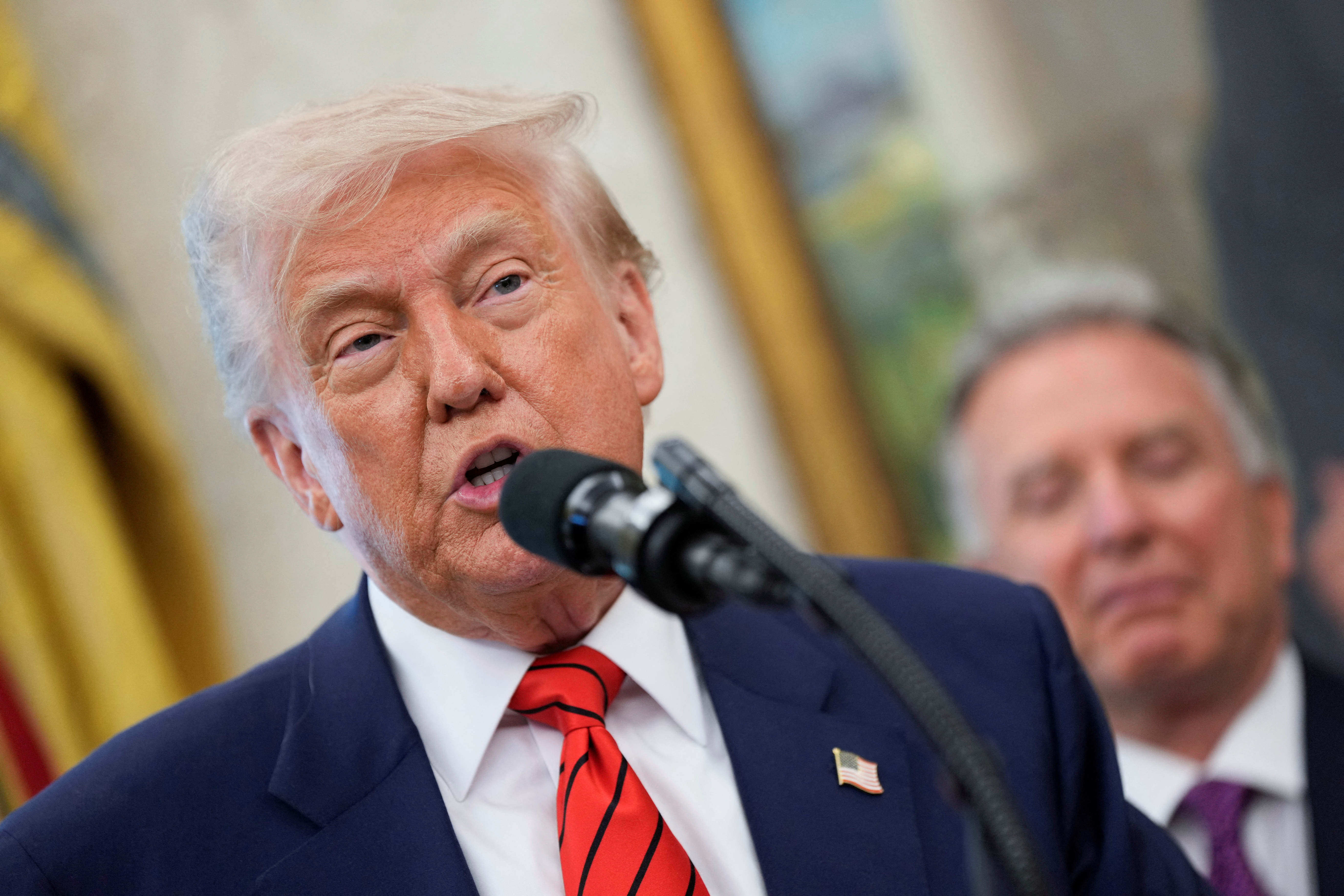 US President Donald Trump speaks in the Oval Office at the White House in Washington, D.C., US [File: Kent Nishimura/Reuters]
