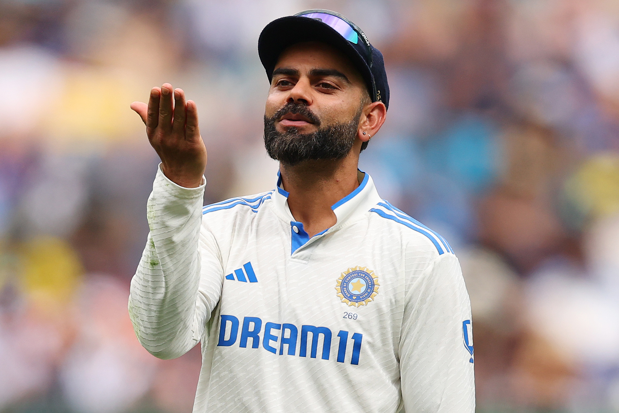 Virat Kohli reacts.