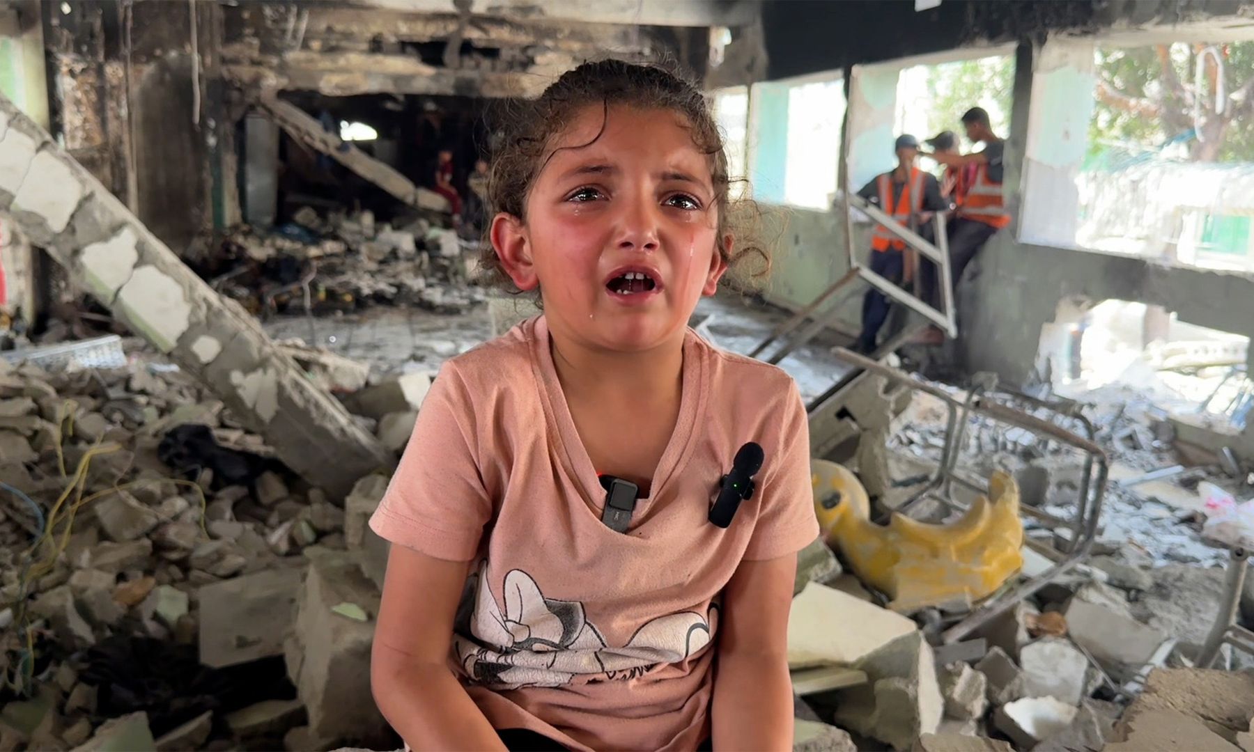 Five-year-old Ward Khalil talking about her ordeal in the ruins of a building.