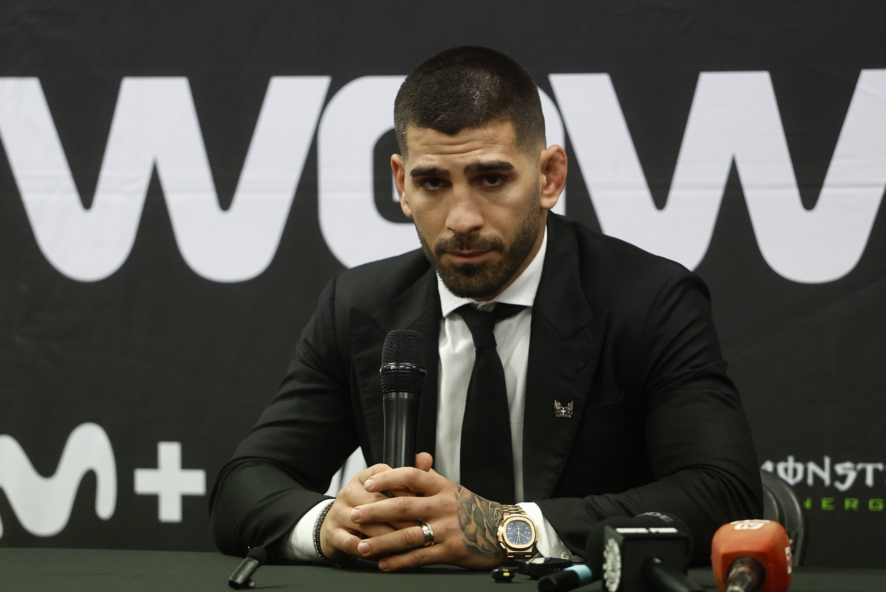 IIia Topuria reacts.