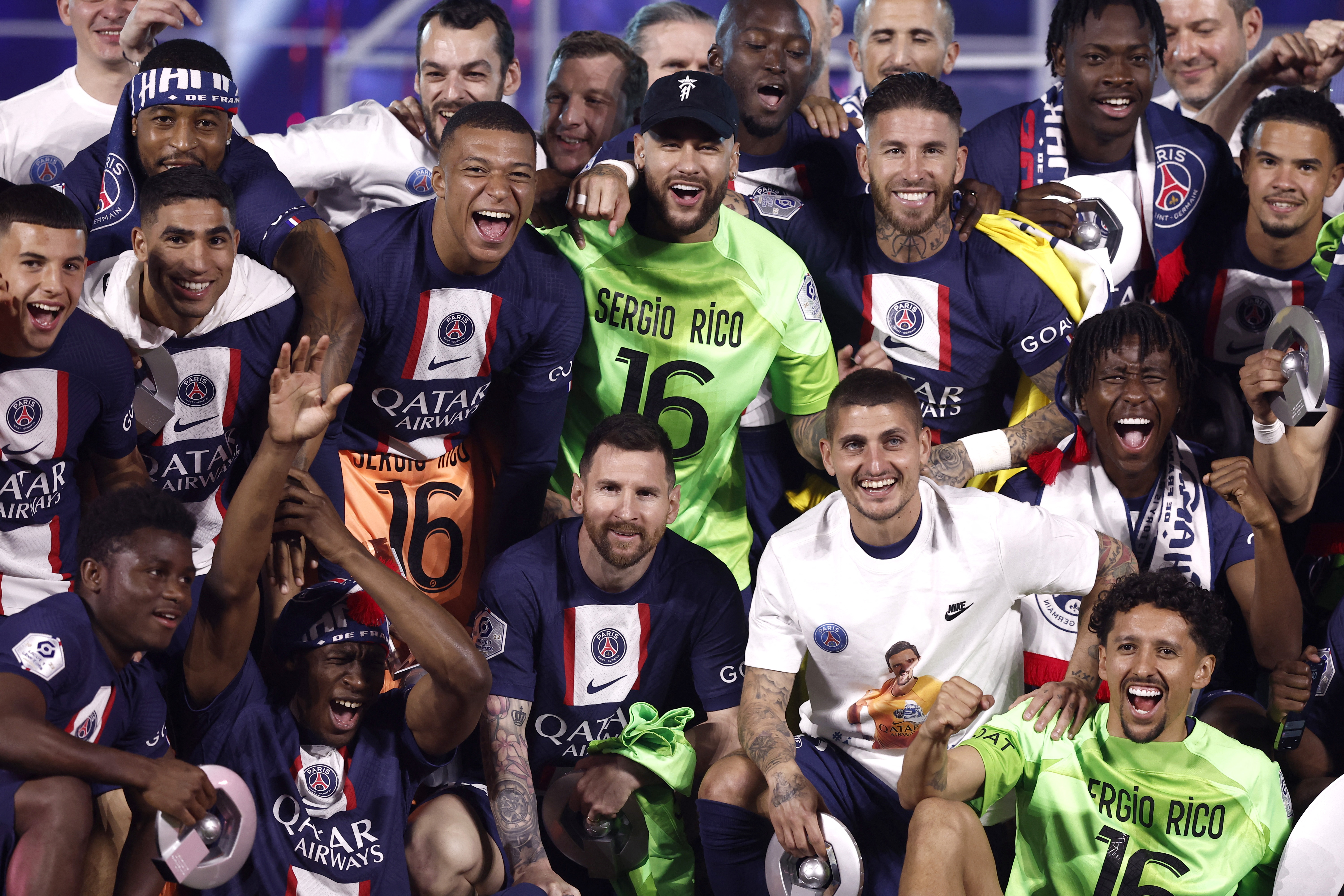Paris St Germain's Lionel Messi, Neymar, Marquinhos, Marco Verratti, Kylian Mbappe, Achraf Hakimi, Sergio Ramos and teammates celebrate winning the Ligue 1