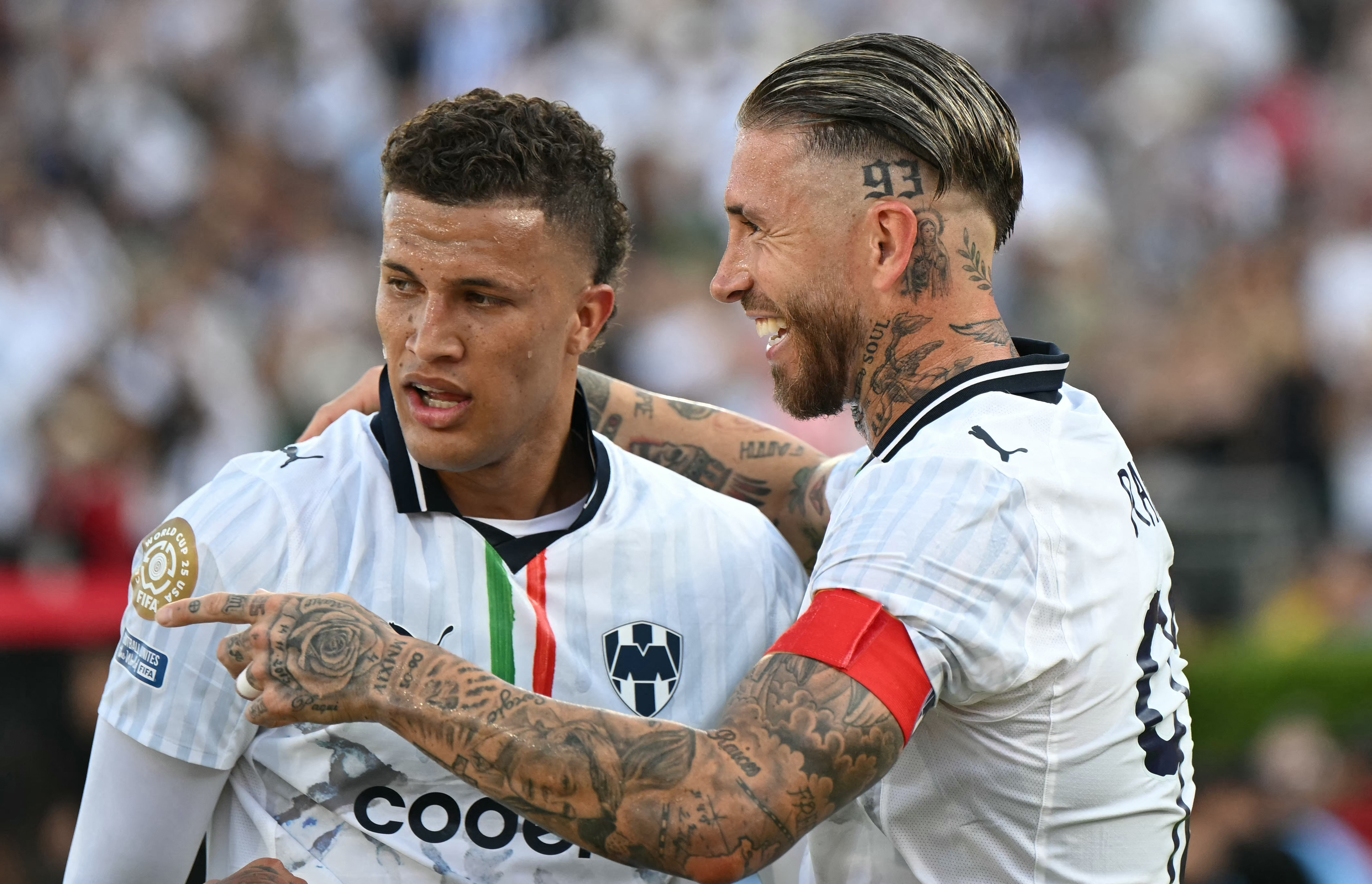 Monterrey's Colombian midfielder #06 Nelson Deossa and Spanish defender #93 Sergio Ramos celebrate a goal during the FIFA Club World Cup 2025 Group E football match between Japan's Urawa Red Diamonds and Mexico's Monterrey at the Rose Bowl stadium in Pasadena on June 25, 2025. (Photo by Yuri CORTEZ / AFP)