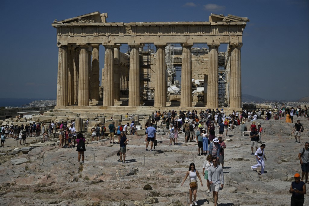 Greece's culture ministry on July 8, 2025, ordered a partial closure of the Acropolis, the country's top monument, to protect visitors amid heatwave conditions. [File: Louisa Gouliamaki/AFP]