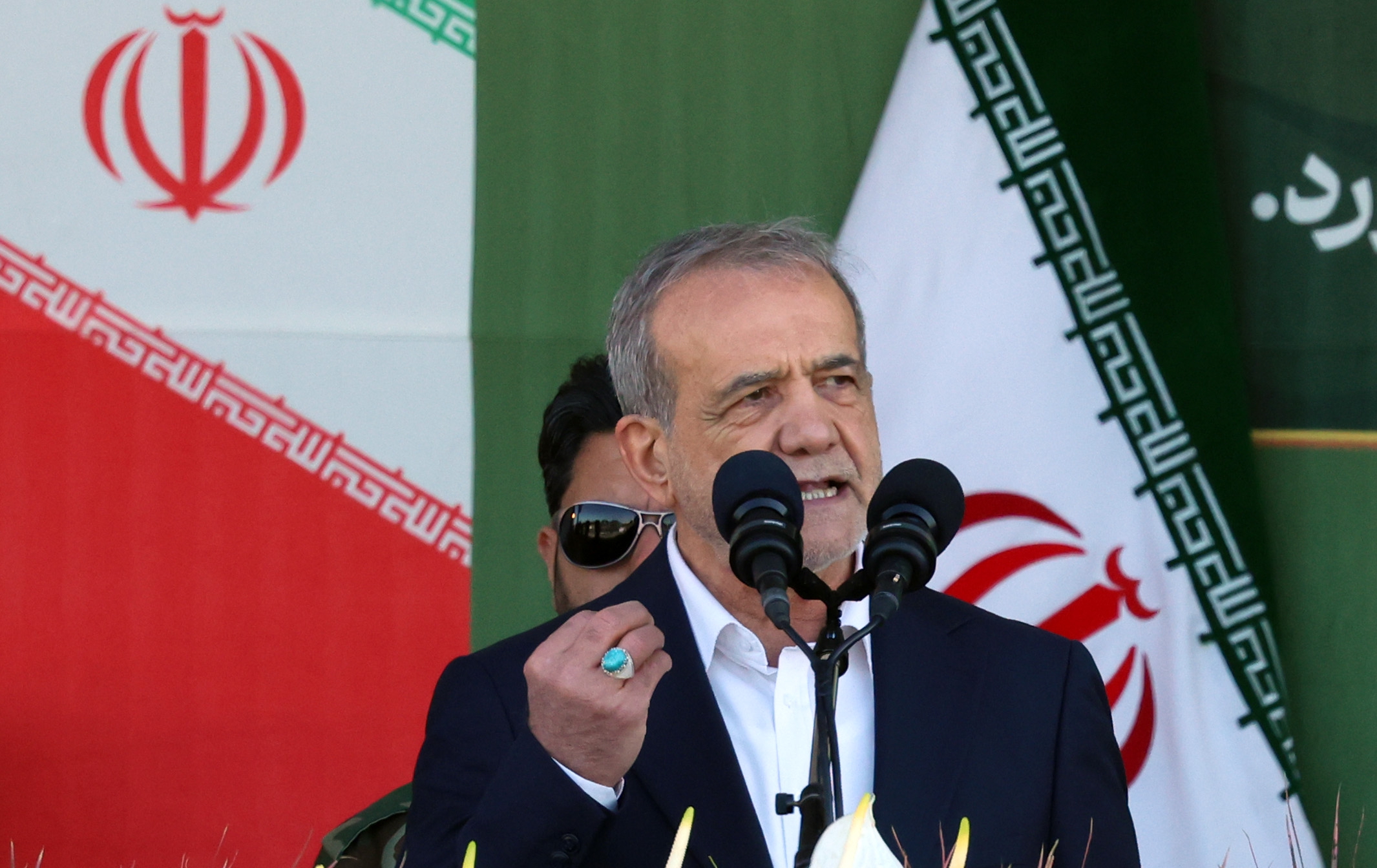Iranian President Masoud Pezeshkian speaks to the public.