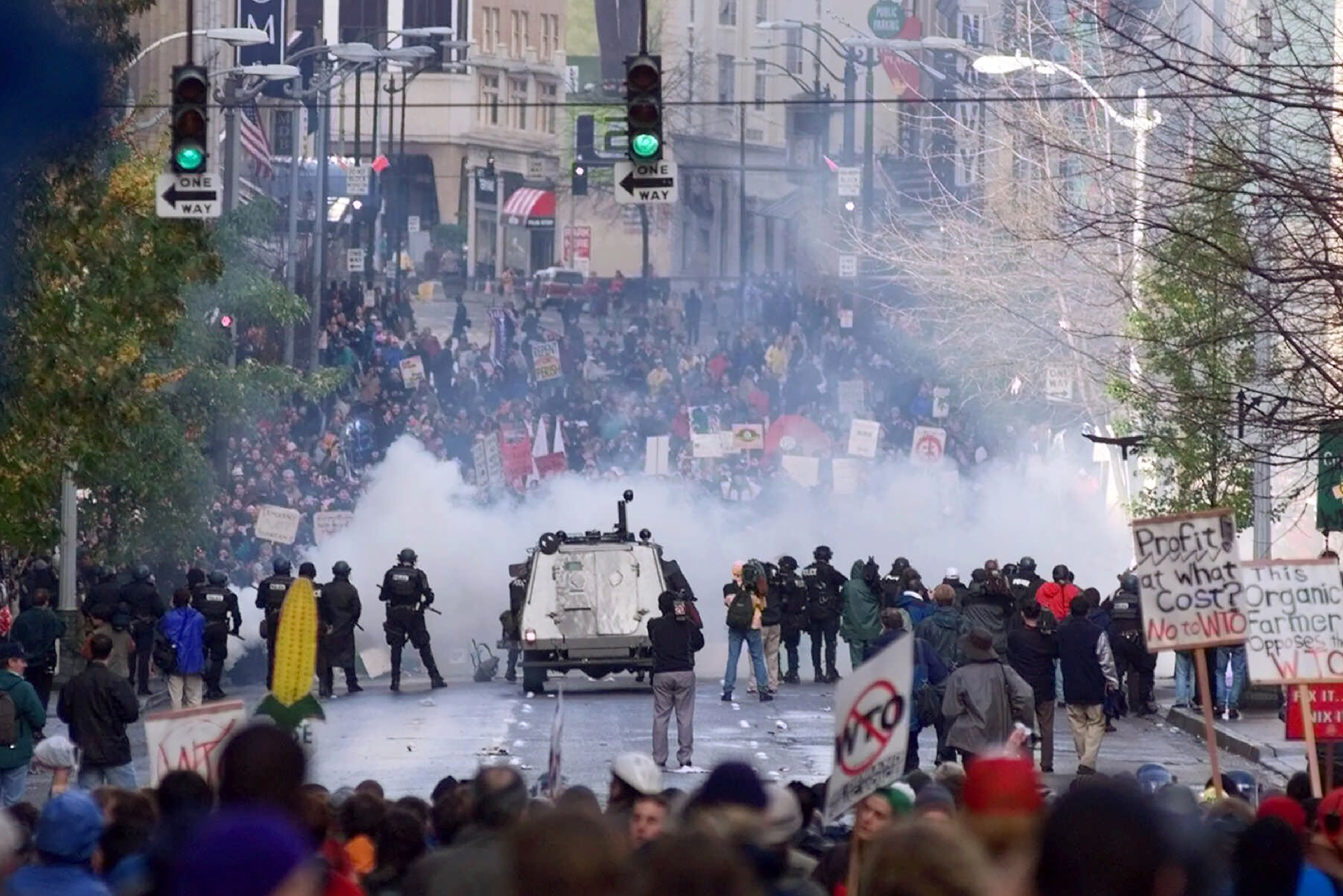 Seattle police use tear gas to push back World Trade Organization protesters in downtown Seattle in November 1999