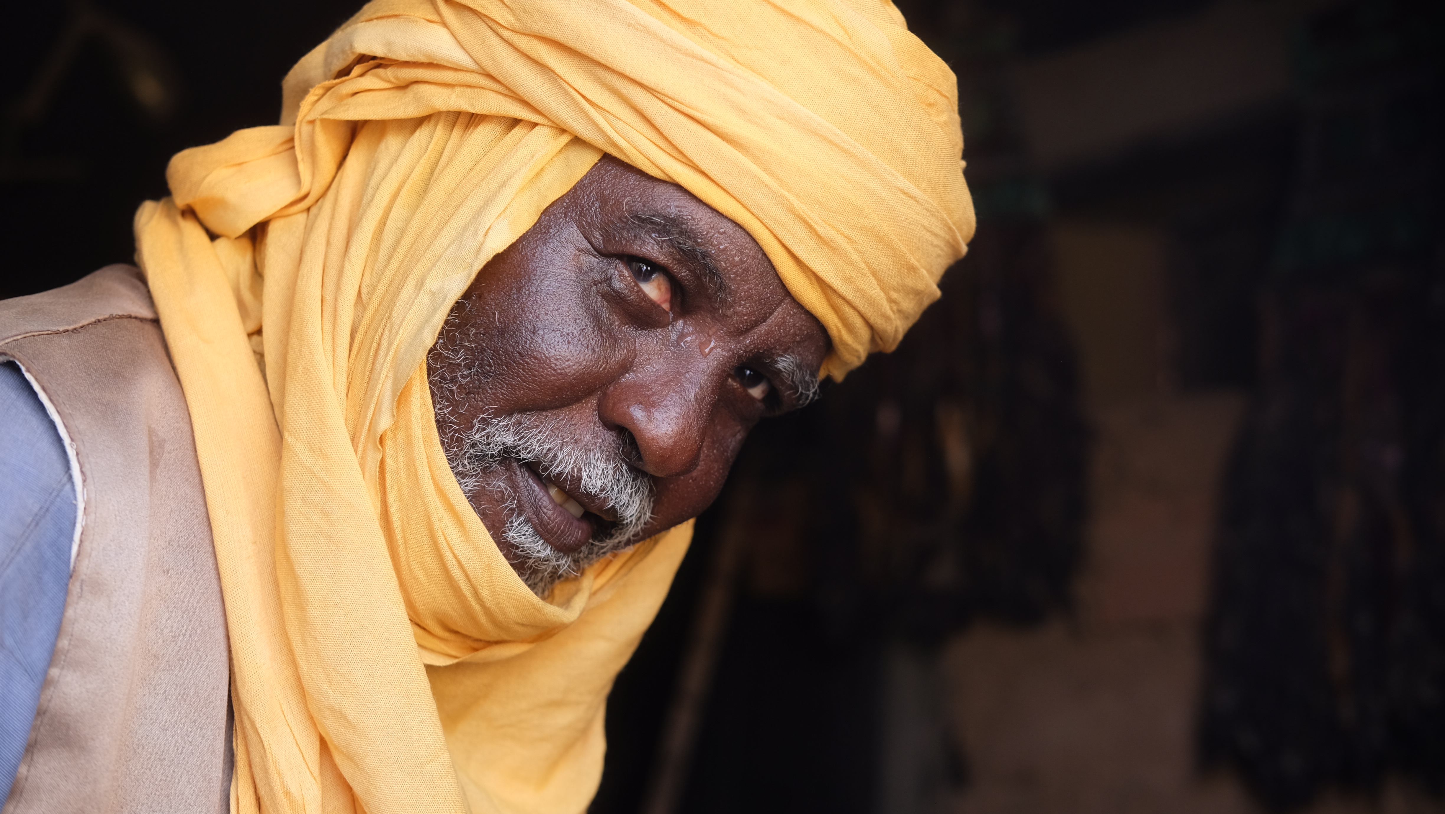 Elhadj Illo bends in his store