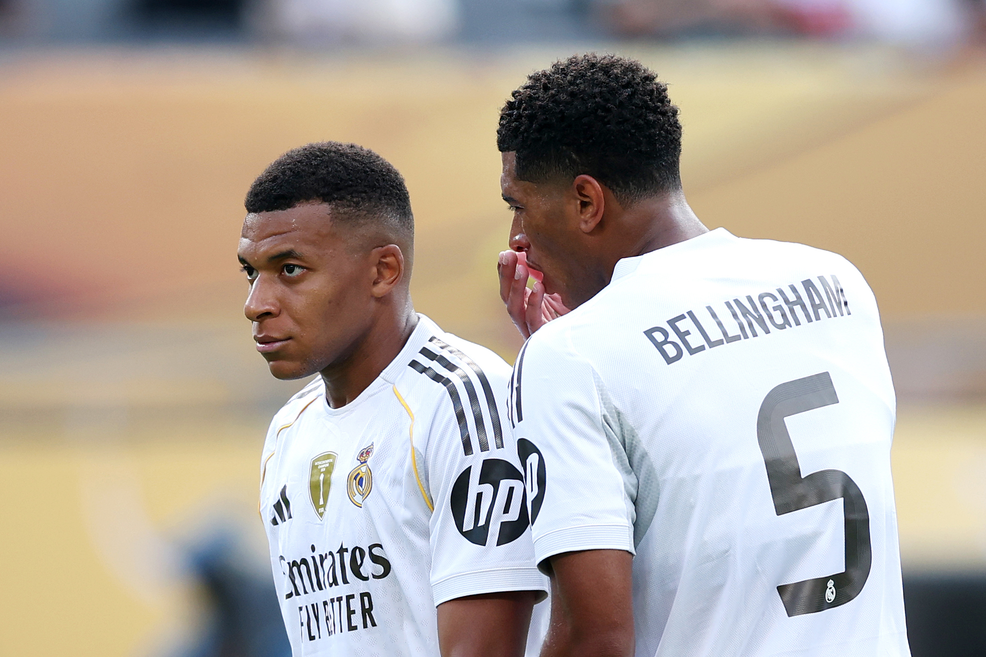 Kylian Mbappe speaks to Jude Bellingham #5 of Real Madrid C.F. during the FIFA Club World Cup 2025 semi-final match