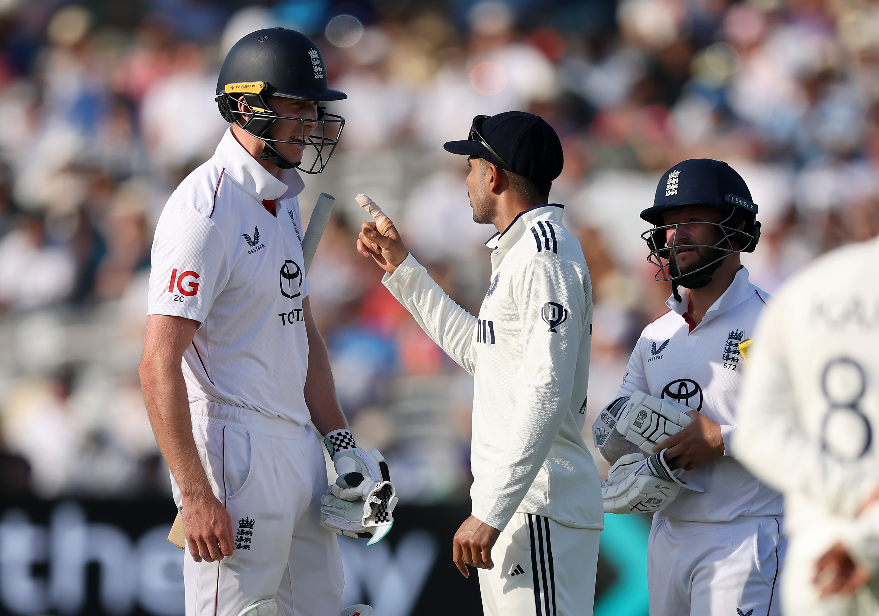 Shubman Gill of India interacts with Zak Crawley of England in the final over of the day during Day Three of the 3rd Rothesay Test Match between England and India