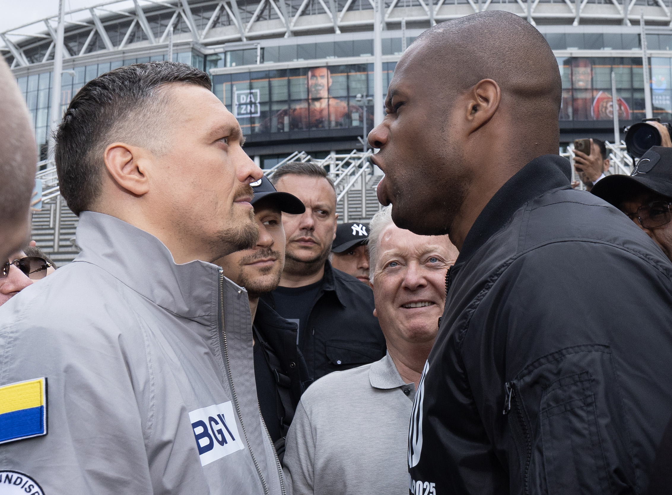 Oleksandr Usyk and Daniel Dubois react.