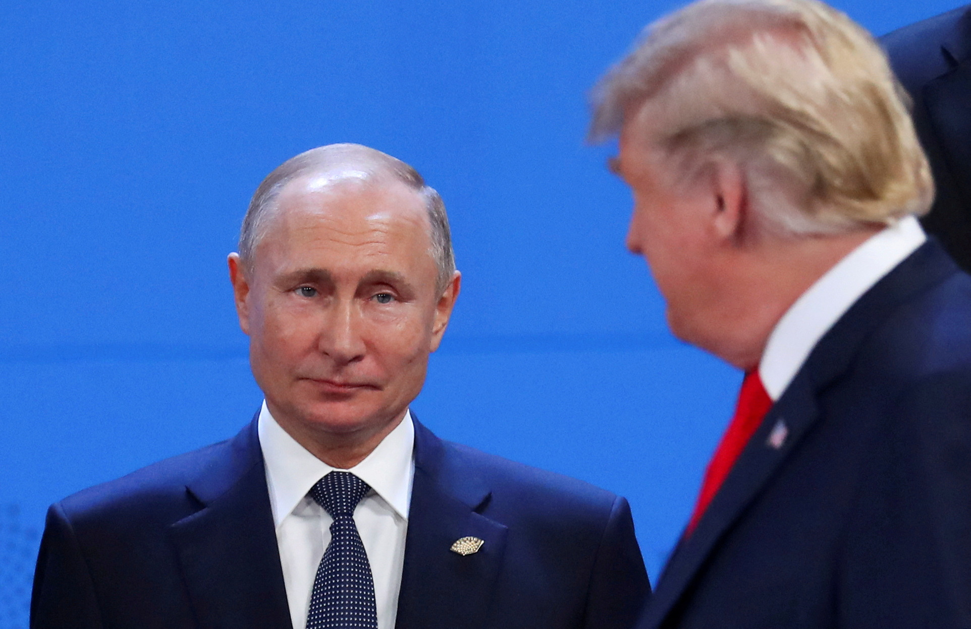 FILE PHOTO: U.S. President Donald Trump and Russia's President Vladimir Putin are seen during the G20 leaders summit in Buenos Aires, Argentina November 30, 2018. REUTERS/Marcos Brindicci/File Photo