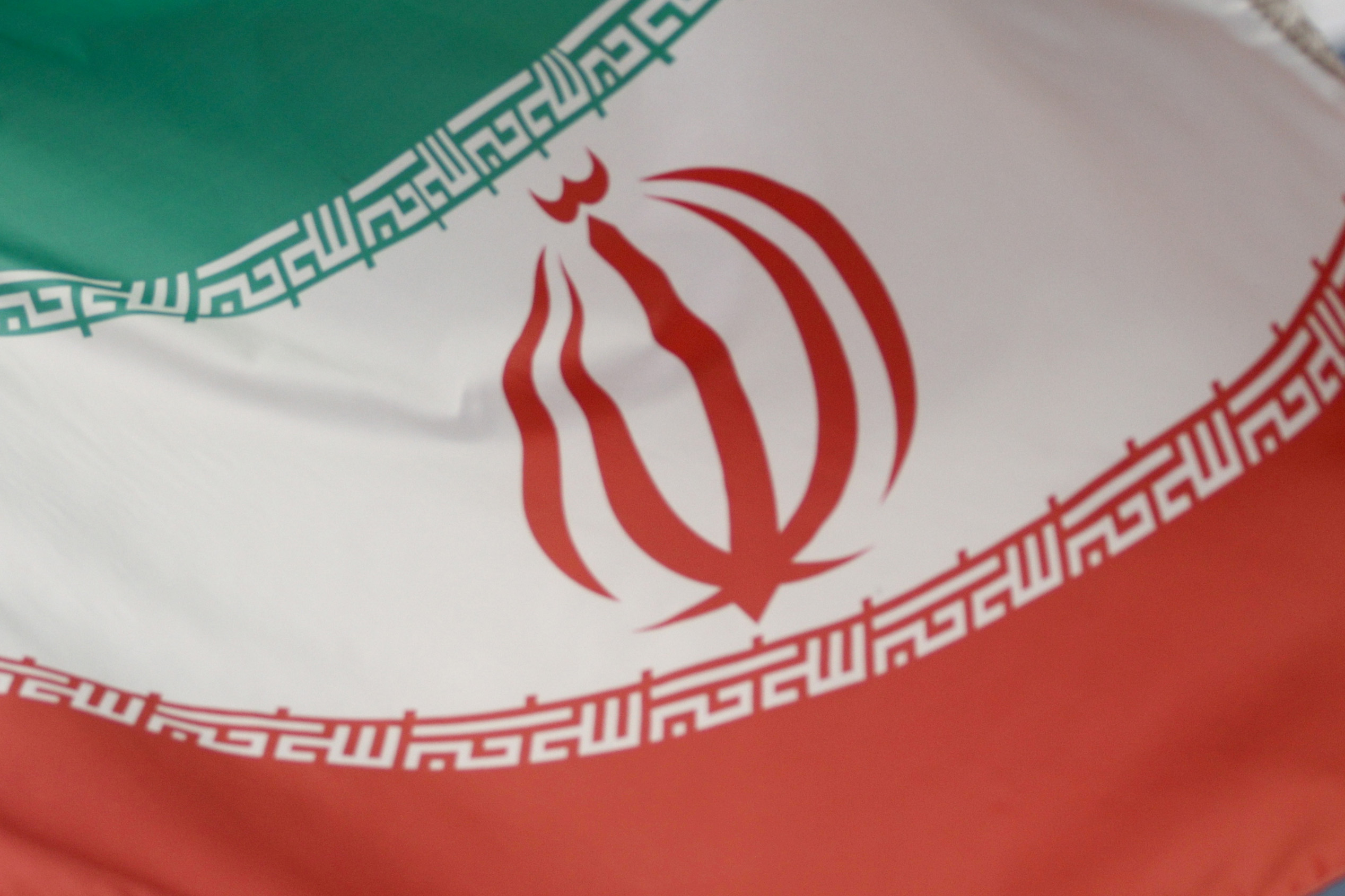 The Iranian flag waves in front of the International Atomic Energy Agency (IAEA) headquarters in Vienna, Austria on March 1, 2021.