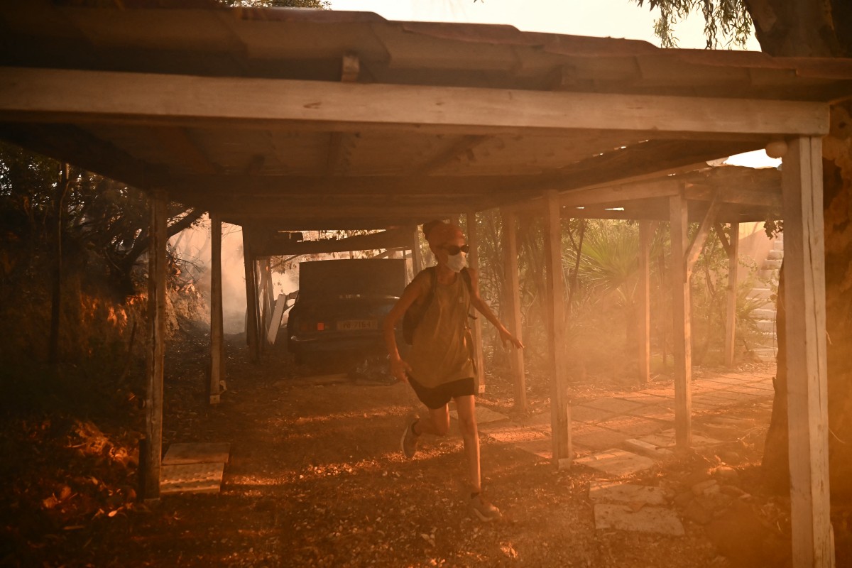 Deadly wildfires sweep across southern Europe as heatwave fuels destruction