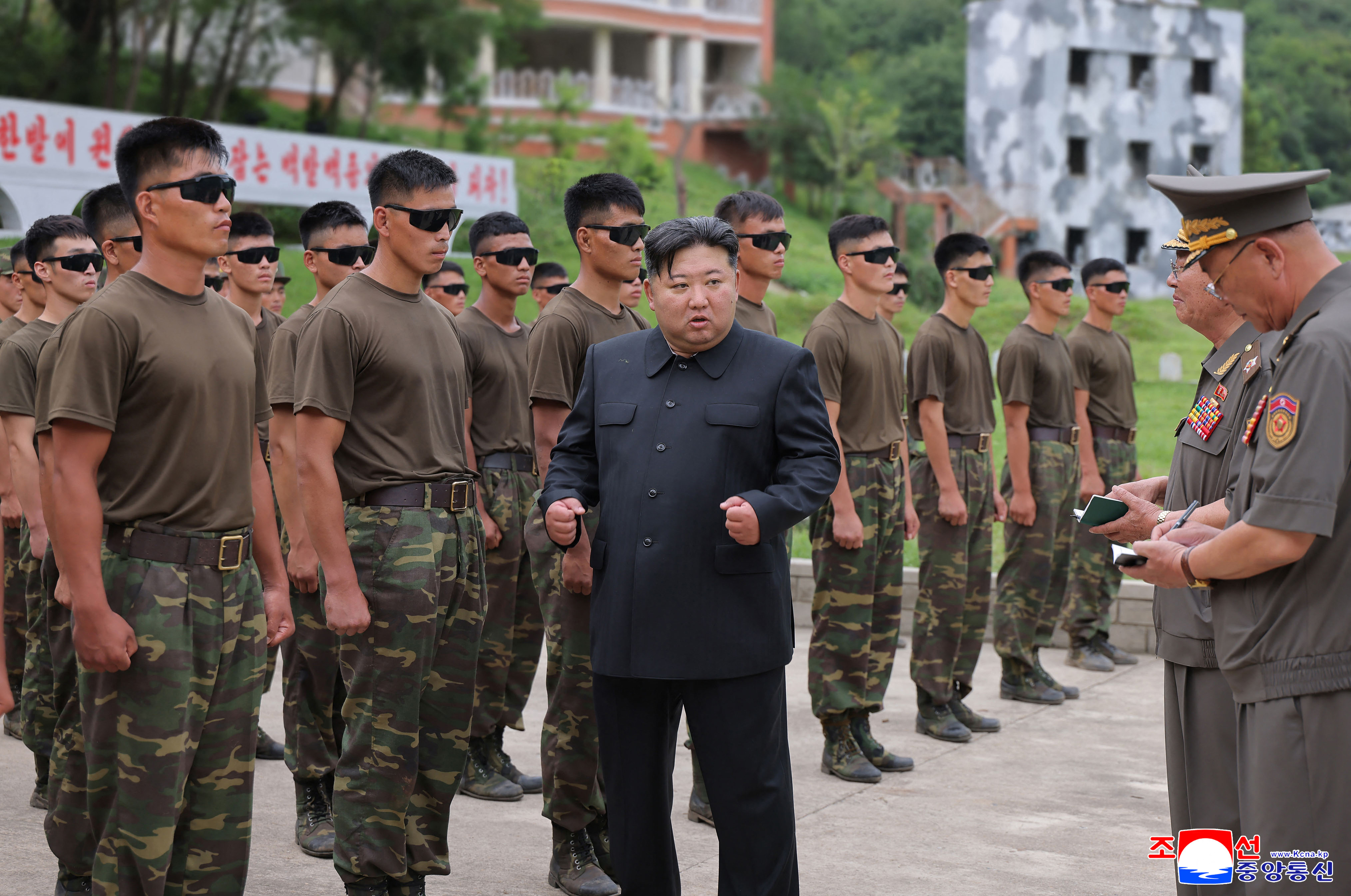 This picture taken on August 27, 2025 and released by North Korea's official Korean Central News Agency (KCNA) on August 28, 2025 shows North Korean leader Kim Jong Un (C) visiting the special operation training base directly under the authority of the General Staff of the Korean People's Army and inspecting the training status of the sniper unit, at an undisclosed location in North Korea. (Photo by KCNA VIA KNS / AFP) / SOUTH KOREA OUT / ---EDITORS NOTE--- RESTRICTED TO EDITORIAL USE - MANDATORY CREDIT "AFP PHOTO/KCNA VIA KNS" - NO MARKETING NO ADVERTISING CAMPAIGNS - DISTRIBUTED AS A SERVICE TO CLIENTS THIS PICTURE WAS MADE AVAILABLE BY A THIRD PARTY. AFP CAN NOT INDEPENDENTLY VERIFY THE AUTHENTICITY, LOCATION, DATE AND CONTENT OF THIS IMAGE.