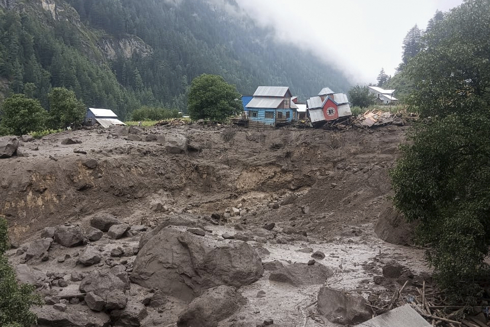 Buildings damaged in flash floods caused by torrential rains are seen in a remote, mountainous village, in Chositi area, Indian controlled Kashmir, Thursday, Aug. 14, 2025. (AP Photo)