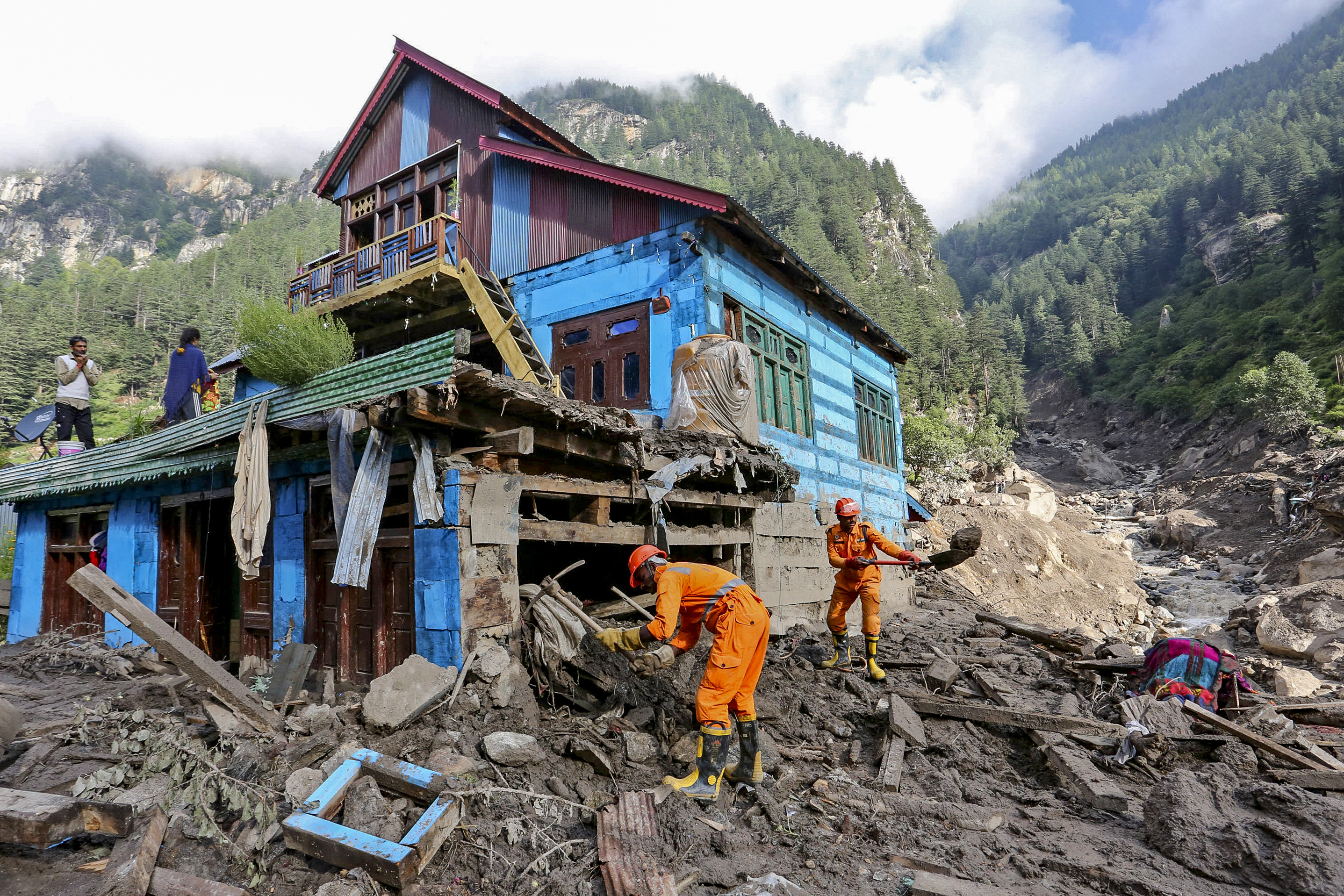 Indian National Disaster Response Force (NDRF) personnel conduct a search and rescue operation at the site of a flash flood at a village in the Kishtwar district of Indian-administered Kashmir on August 16, 2025 [AFP]
