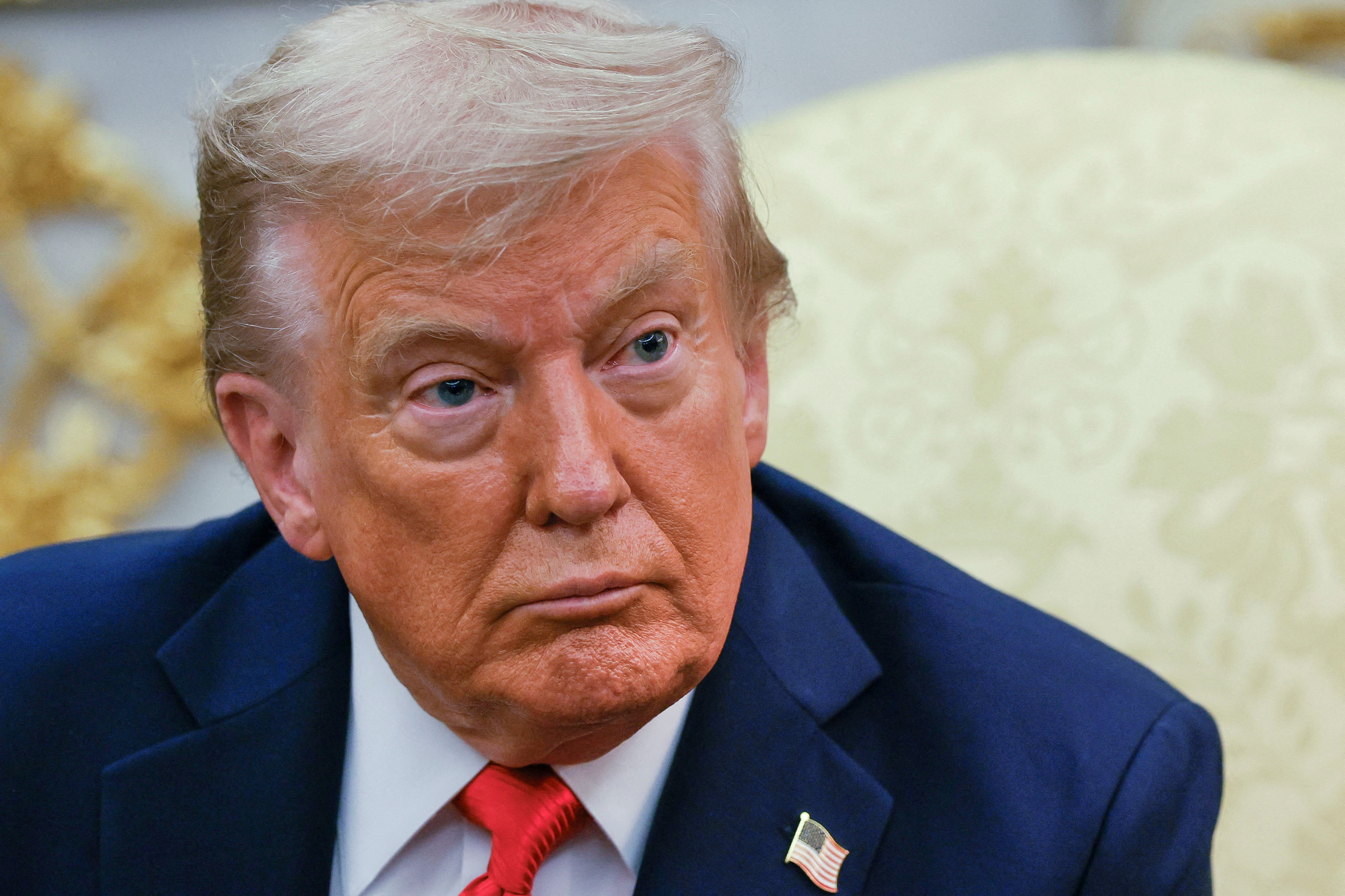 FILE PHOTO: U.S. President Donald Trump attends a meeting with South Korean President Lee Jae Myung (not pictured) at the Oval Office, at the White House, in Washington, D.C., U.S., August 25, 2025. REUTERS/Brian Snyder/File Photo