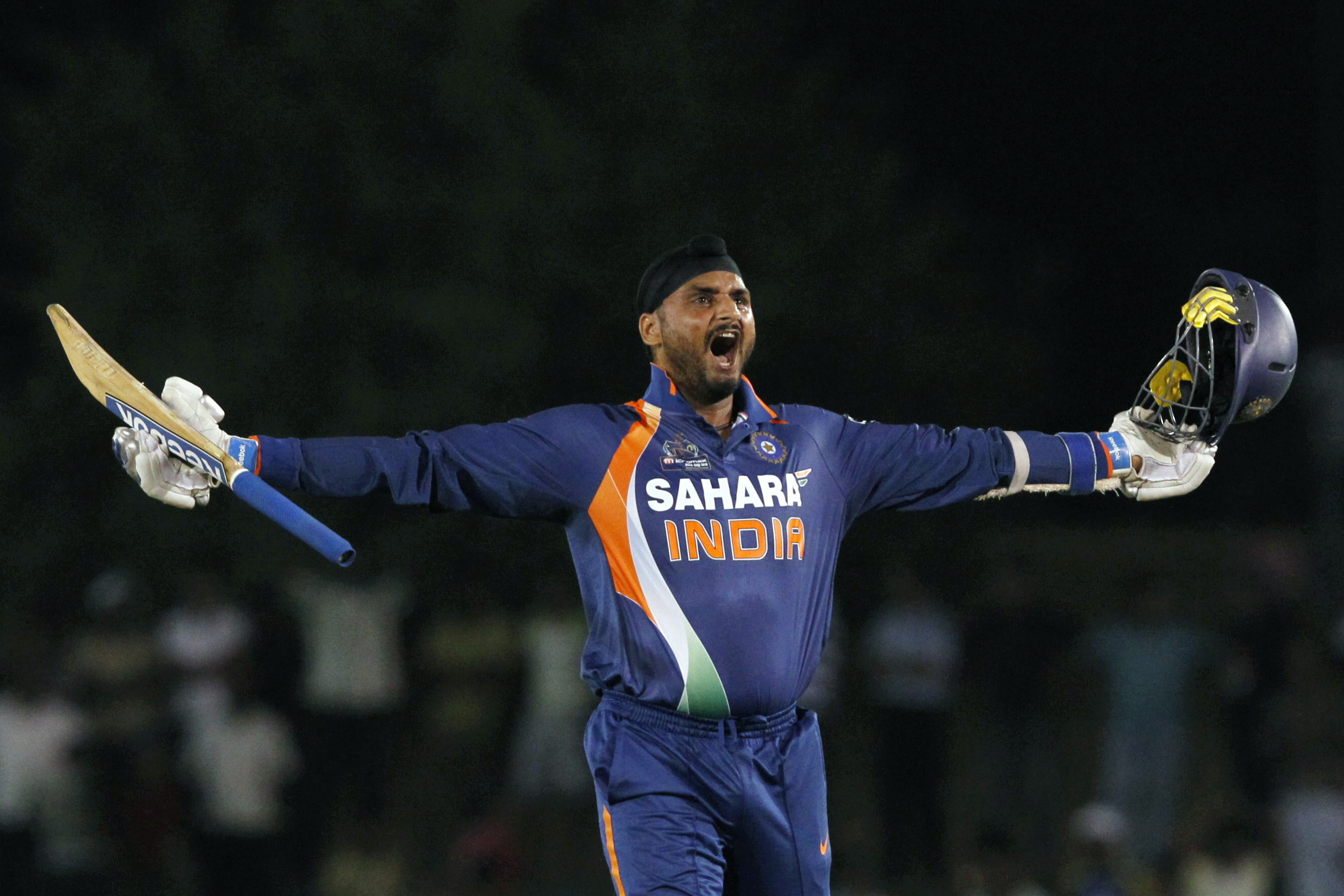 India's Harbhajan Singh celebrates the win over Pakistan in the Asia Cup one-day international cricket tournament in Dambulla June 19, 2010. REUTERS/Andrew Caballero-Reynolds (SRI LANKA - Tags: SPORT CRICKET)