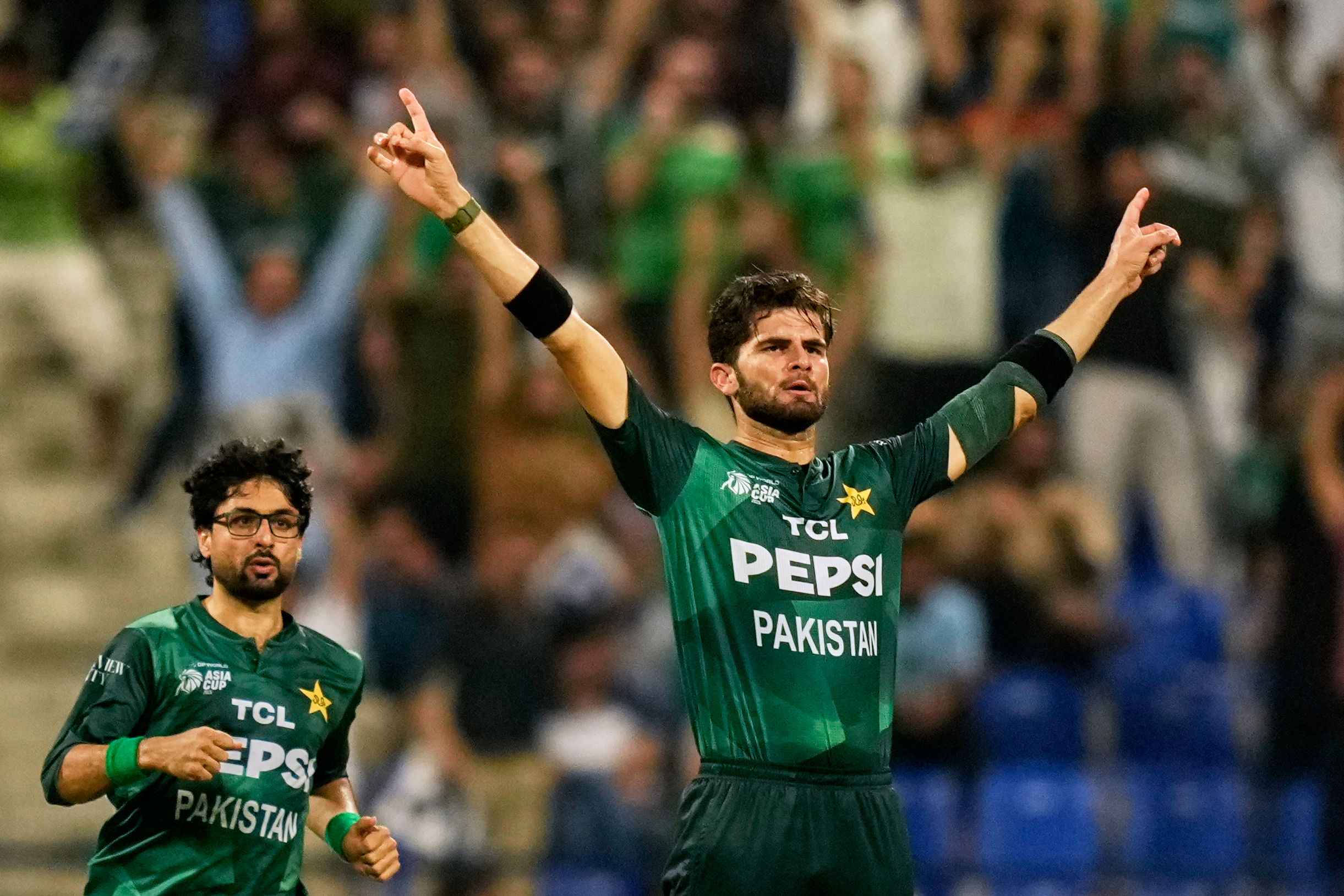 Pakistan's Shaheen Shah Afridi celebrates the dismissal of Sri Lanka's Pathum Nissanka during the Asia cup Cricket match between Pakistan and Sri Lanka at Zayed cricket Stadium in Abu Dhabi, United Arab Emirates, Tuesday, Sept. 23, 2025. (AP Photo/Altaf Qadri)