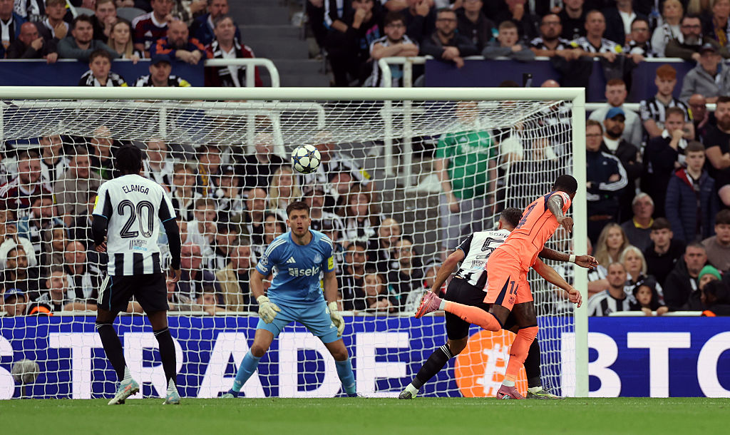Marcus Rashford of FC Barcelona scores his team's first goal past Nick Pope of Newcastle