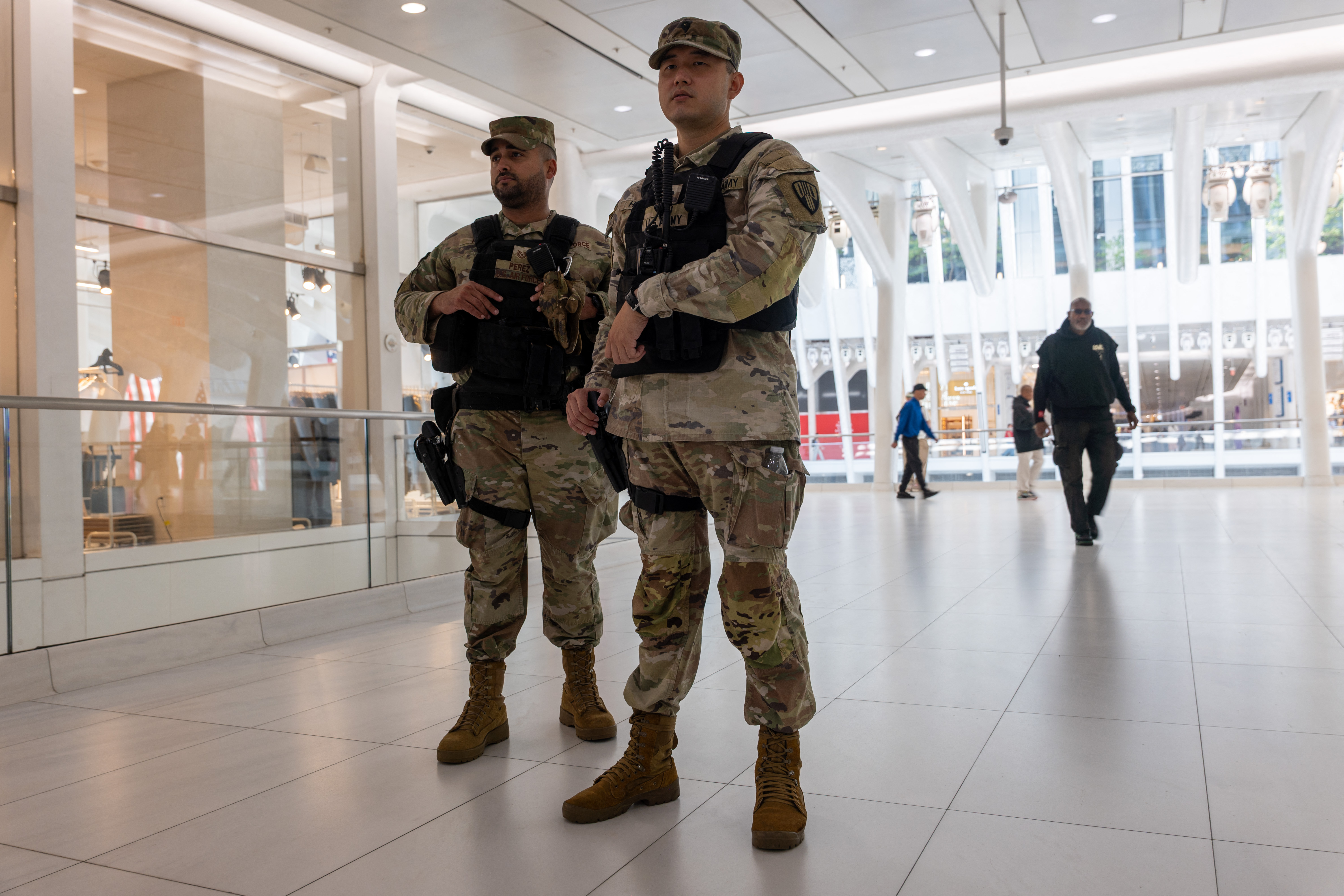 NEW YORK, NEW YORK - SEPTEMBER 11: Members of the National Guard patrol the Oculus at the World Trade Center in lower Manhattan on the 24th anniversary of the 9/11 terror attacks on September 11, 2025, in New York City. The nation is marking the twenty-fourth anniversary of the attacks on September 11, 2001, that killed 2,977 people at the World Trade Center site, the Pentagon, and those aboard Flight 93 in Shanksville, PA. Spencer Platt/Getty Images/AFP (Photo by SPENCER PLATT / GETTY IMAGES NORTH AMERICA / Getty Images via AFP)