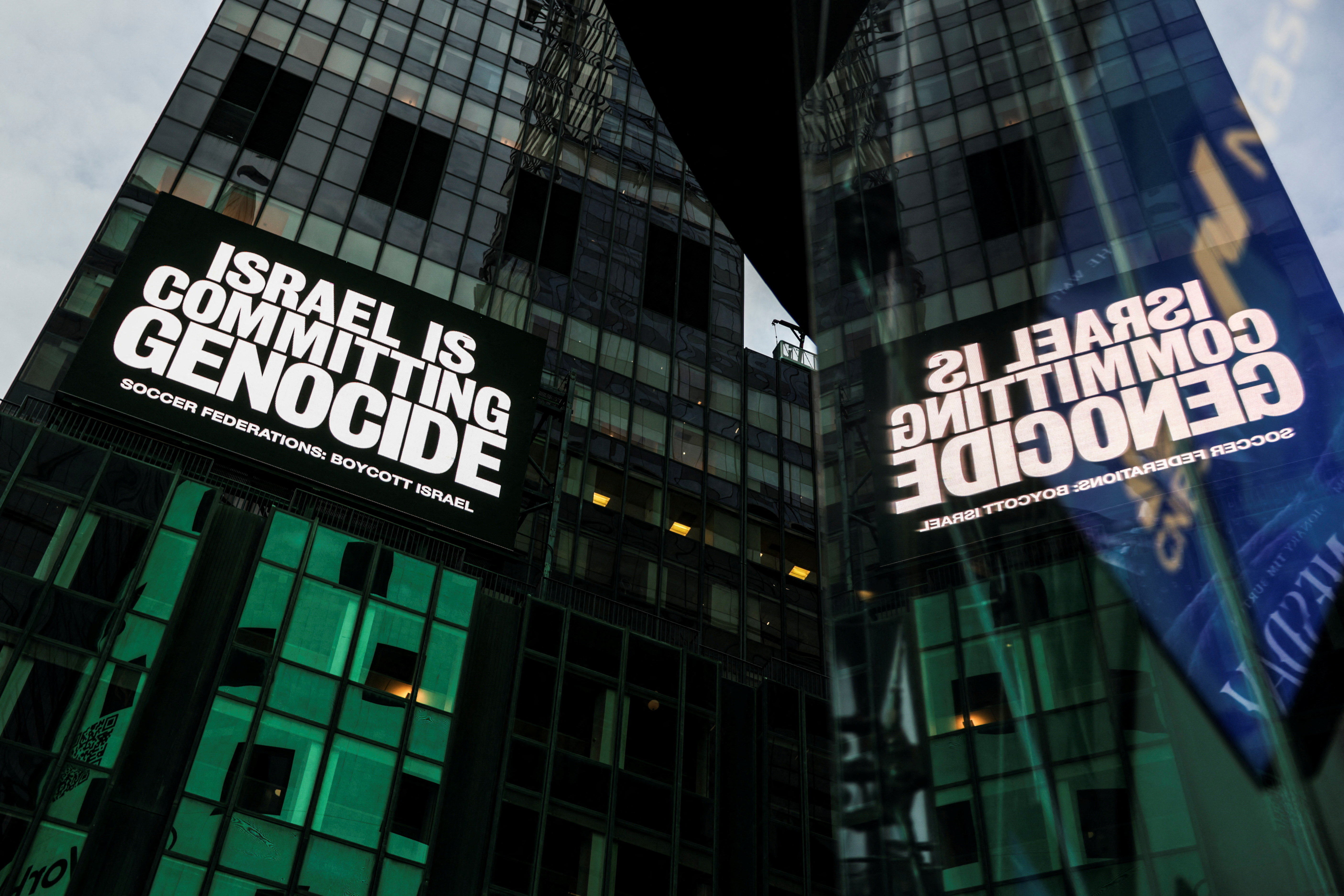 A billboard in Times Square displays the message "Israel is committing genocide" as part of the campaign by Game Over Israel calling for a boycott of Israel by national soccer federations over the war in Gaza, in New York City, U.S., September 16, 2025. Israel is fighting a genocide case at the International Court of Justice in The Hague and has rejected such accusations, citing its right to self-defense following the deadly October 7, 2023, Hamas attack. REUTERS/Jeenah Moon