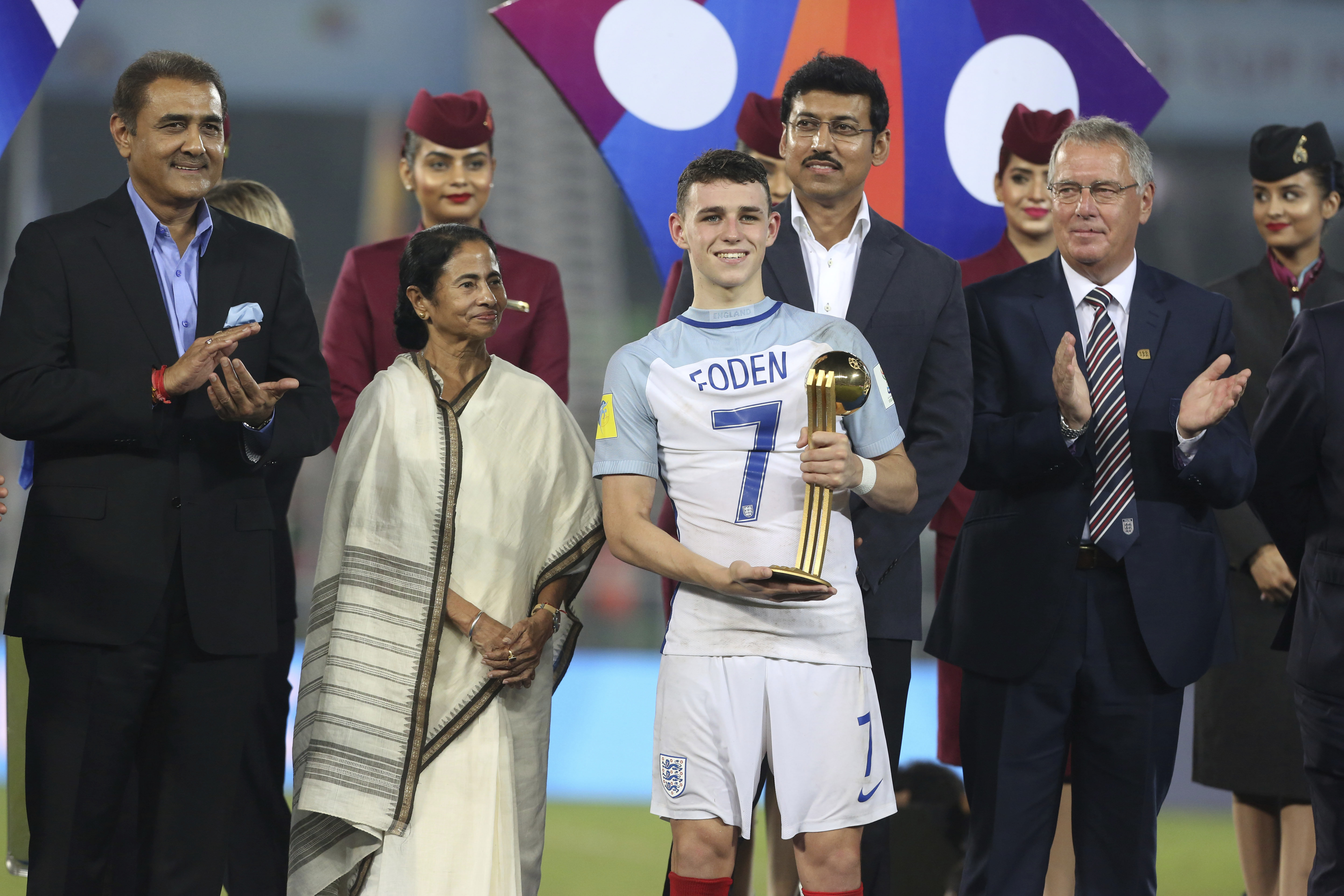 England's Philip Foden poses with the Golden Ball award during the presentation ceremony for FIFA U-17 World Cup in Kolkata, India, Saturday, Oct. 28, 2017. (AP Photo/Anupam Nath)