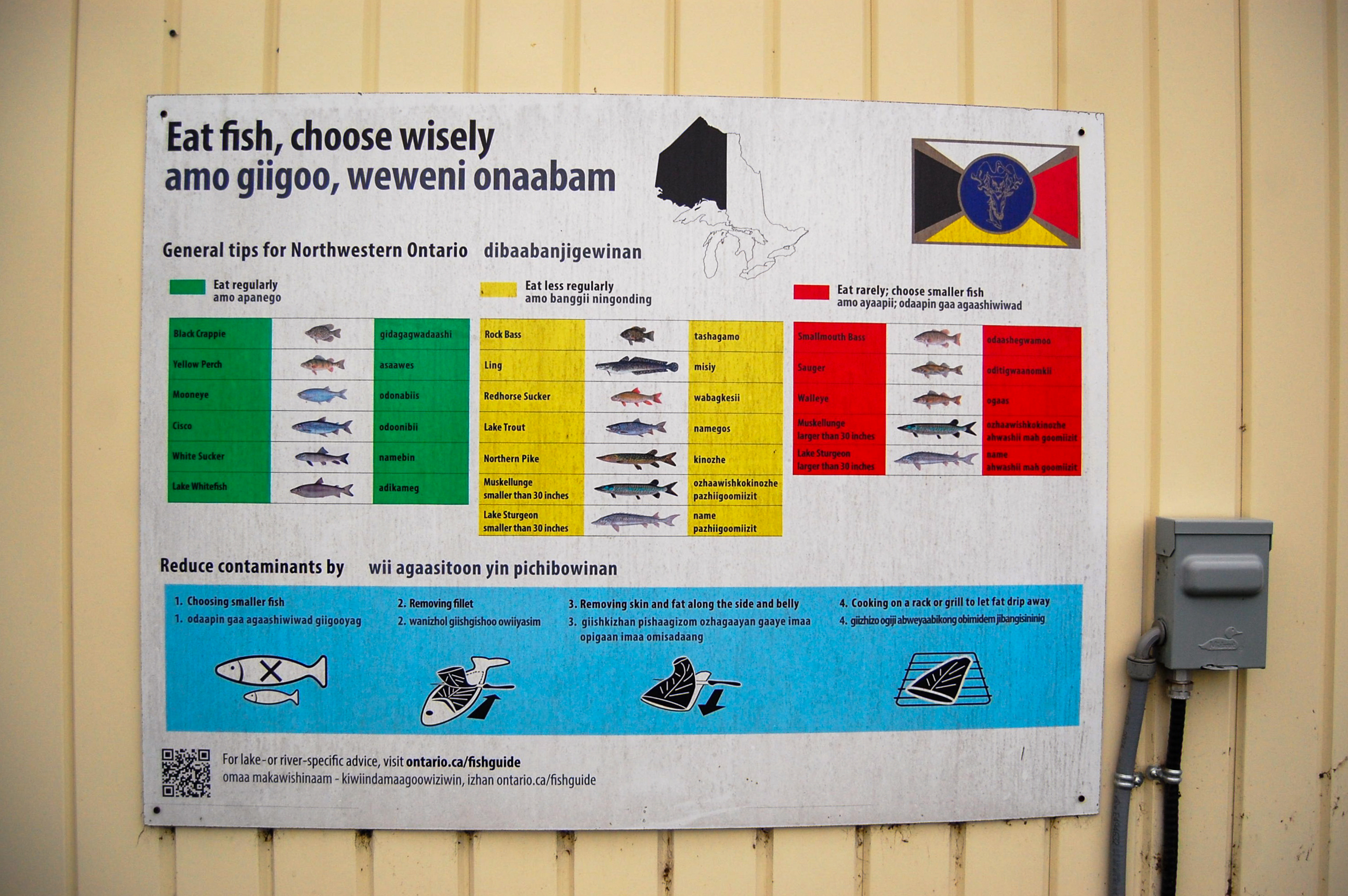 A provincial advisory on fish consumption, on a trailer in Grassy Narrows