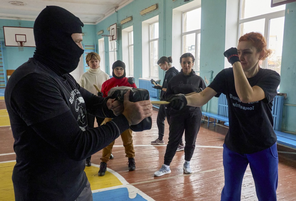 Ukrainians attend a knife-fighting training for civilians organized by the Center for Training Citizens for National Resistance in Kharkiv, northeastern Ukraine, 01 November 2025, amid the ongoing Russian invasion. Russian troops entered Ukrainian territory on 24 February 2022, starting a conflict that has provoked destruction and a humanitarian crisis. EPA/SERGEY KOZLOV