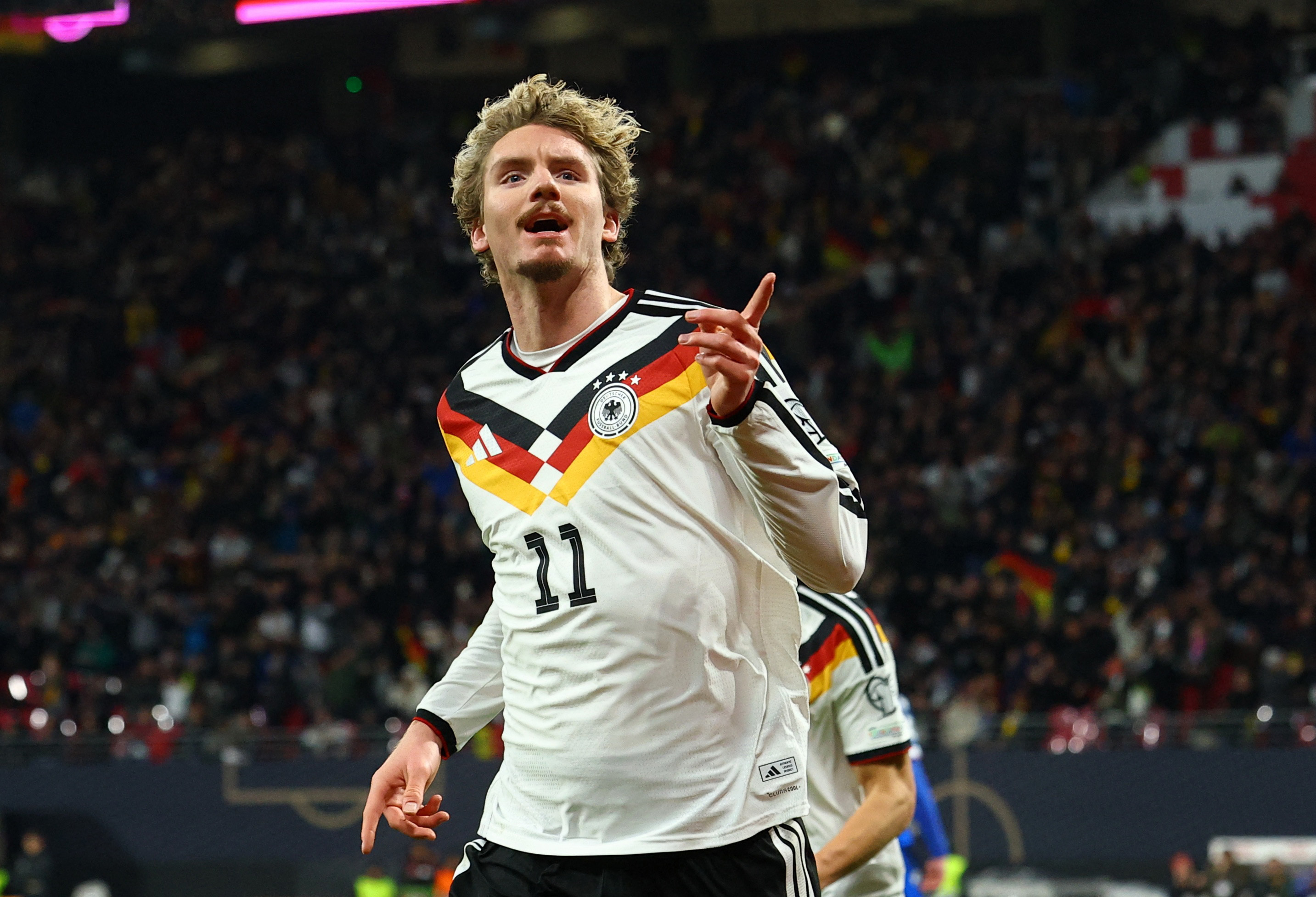 Nick Woltemade recats.