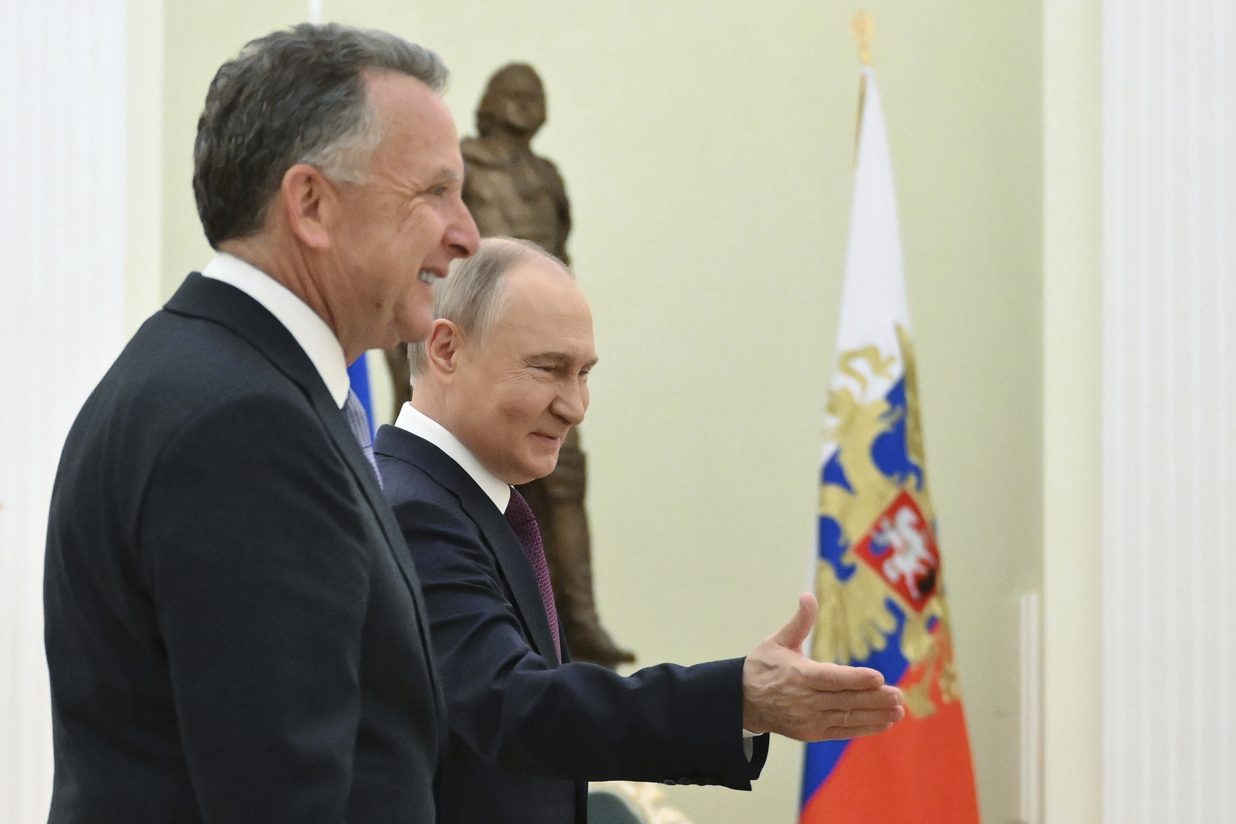 Russian President Vladimir Putin, centre , welcomes U.S. President Donald Trump's special envoy Steve Witkoff to their talks at the Kremlin in Moscow, Russia, Friday, April 25, 2025. (Kristina Kormilitsyna, Sputnik, Kremlin Pool Photo via AP)