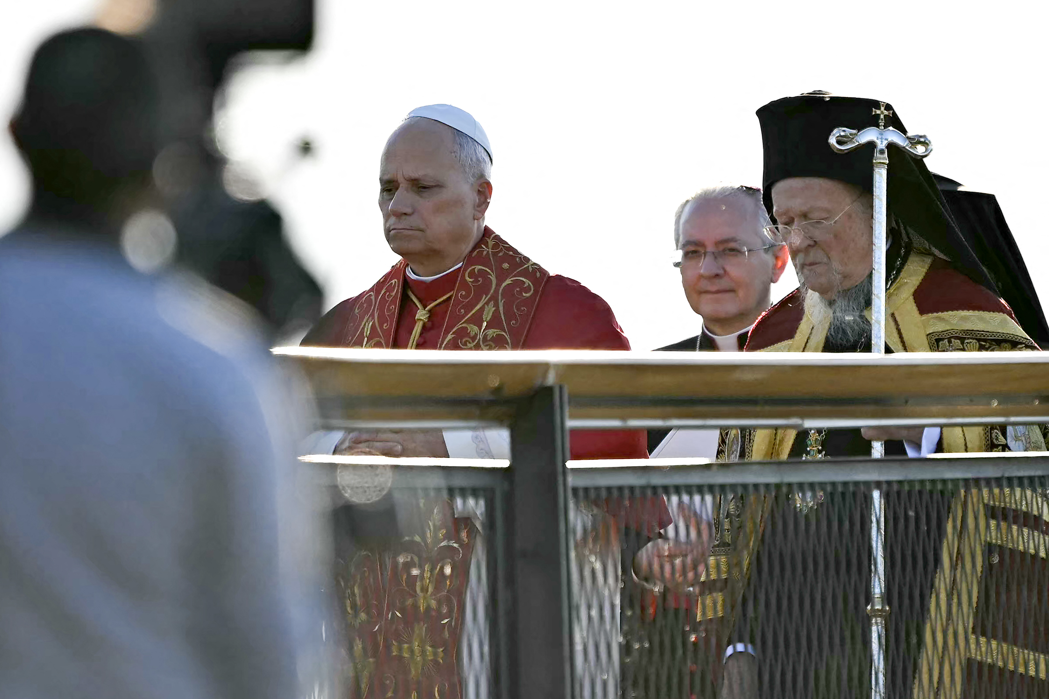 Pope Leo XIV and Patriarch Bartholomew I of Constantinople leave after attending an ecumenical prayer service near the sunken Byzantine Basilica of Saint Neophytos by Lake Iznik